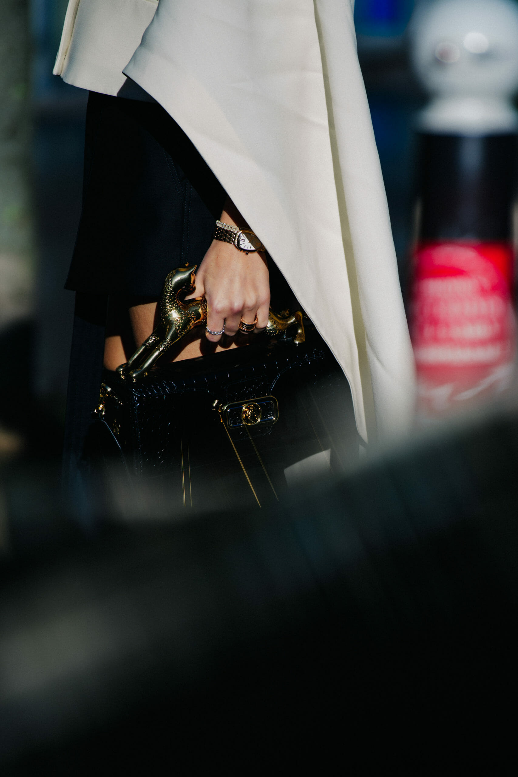 Woman carrying large hadnle purse