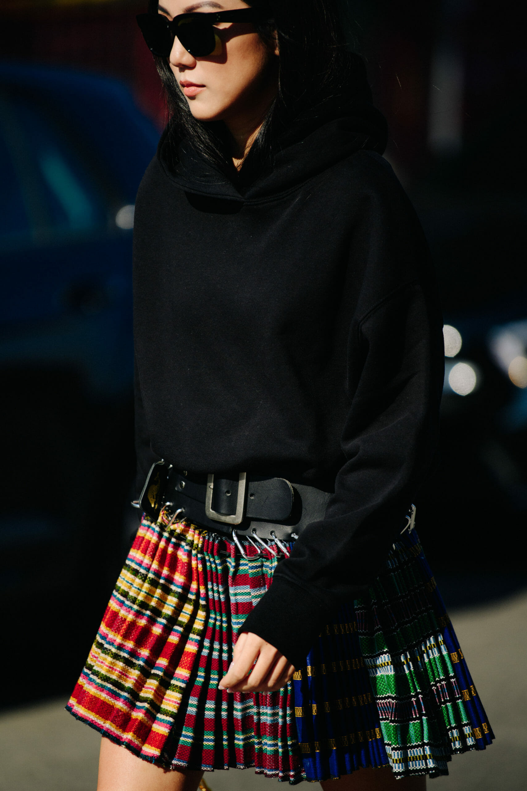 Woman wearing short check skirt