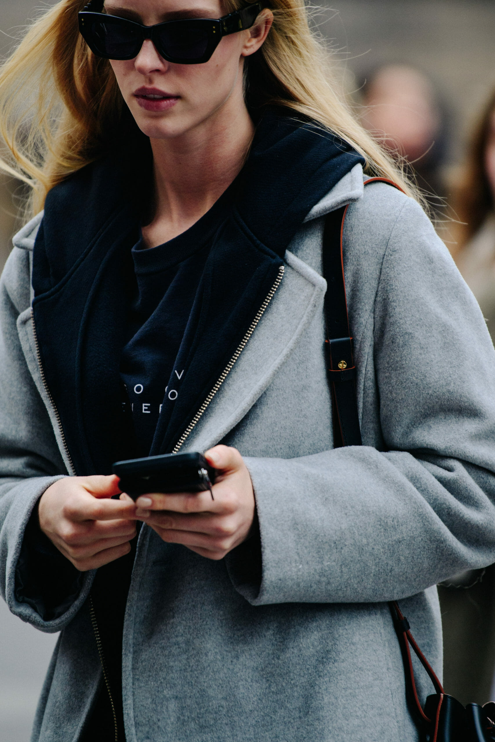 Model wearing grey wool coat
