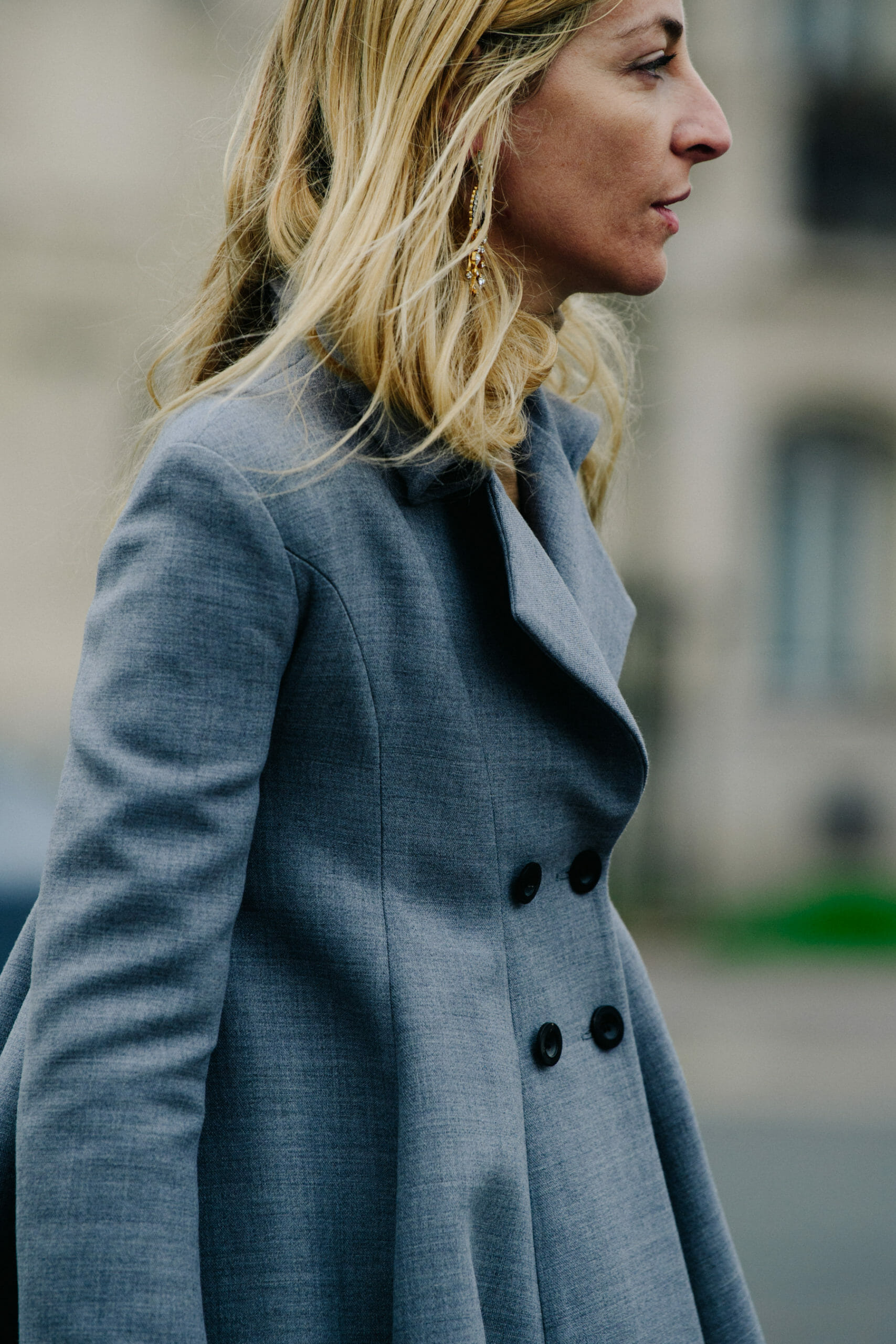 Woman wearing grey coat