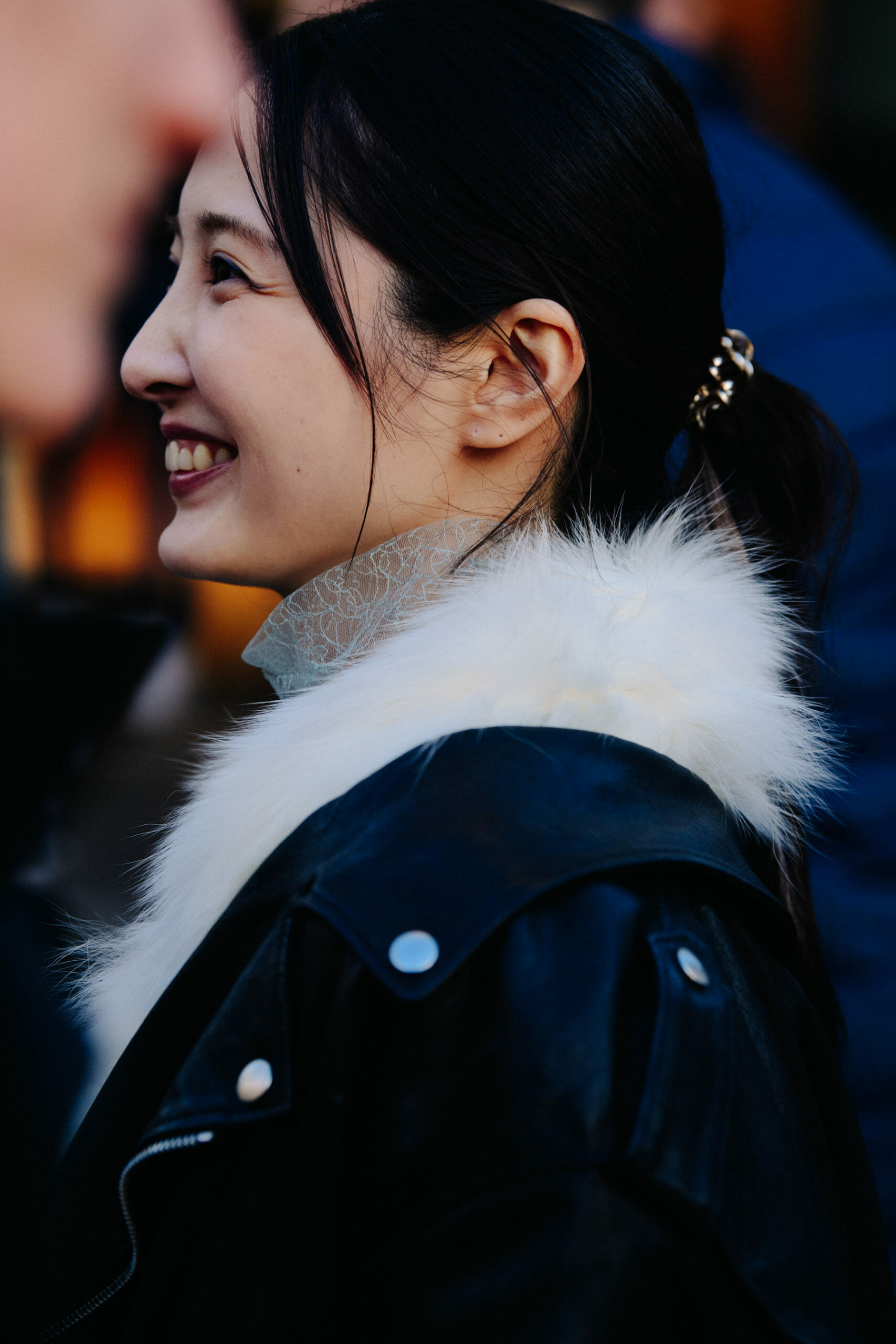 Woman wearing fur collar