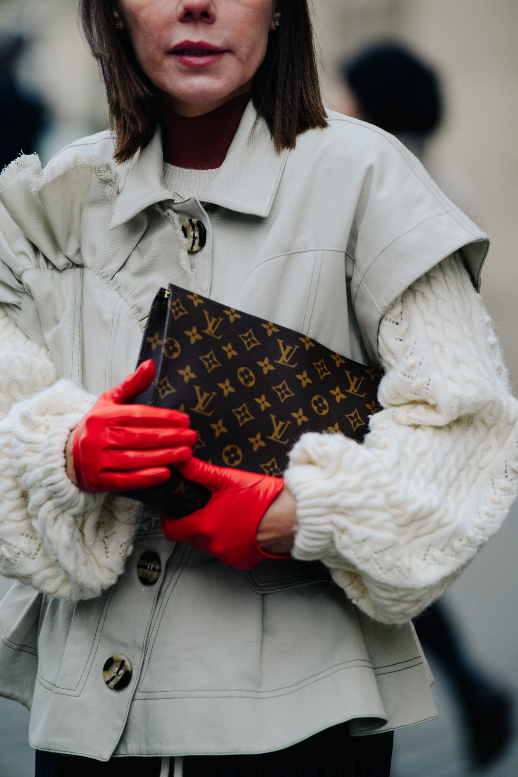 Woman wearing red gloves