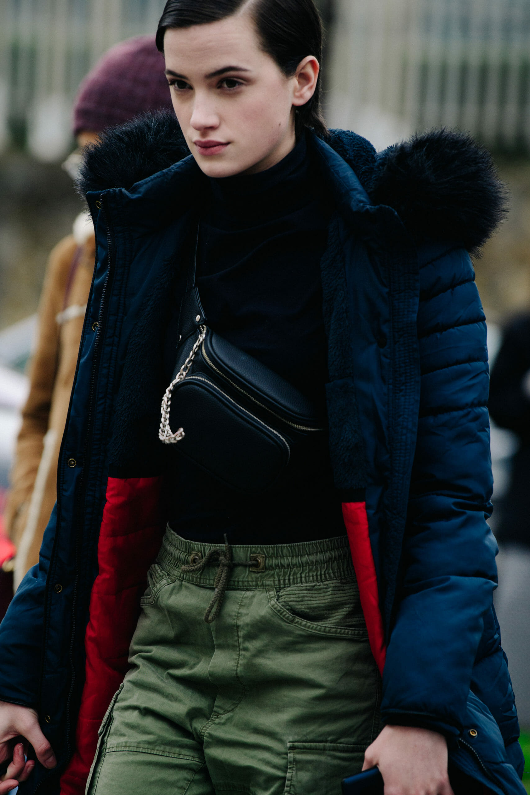 Woman wearing fur trim coat