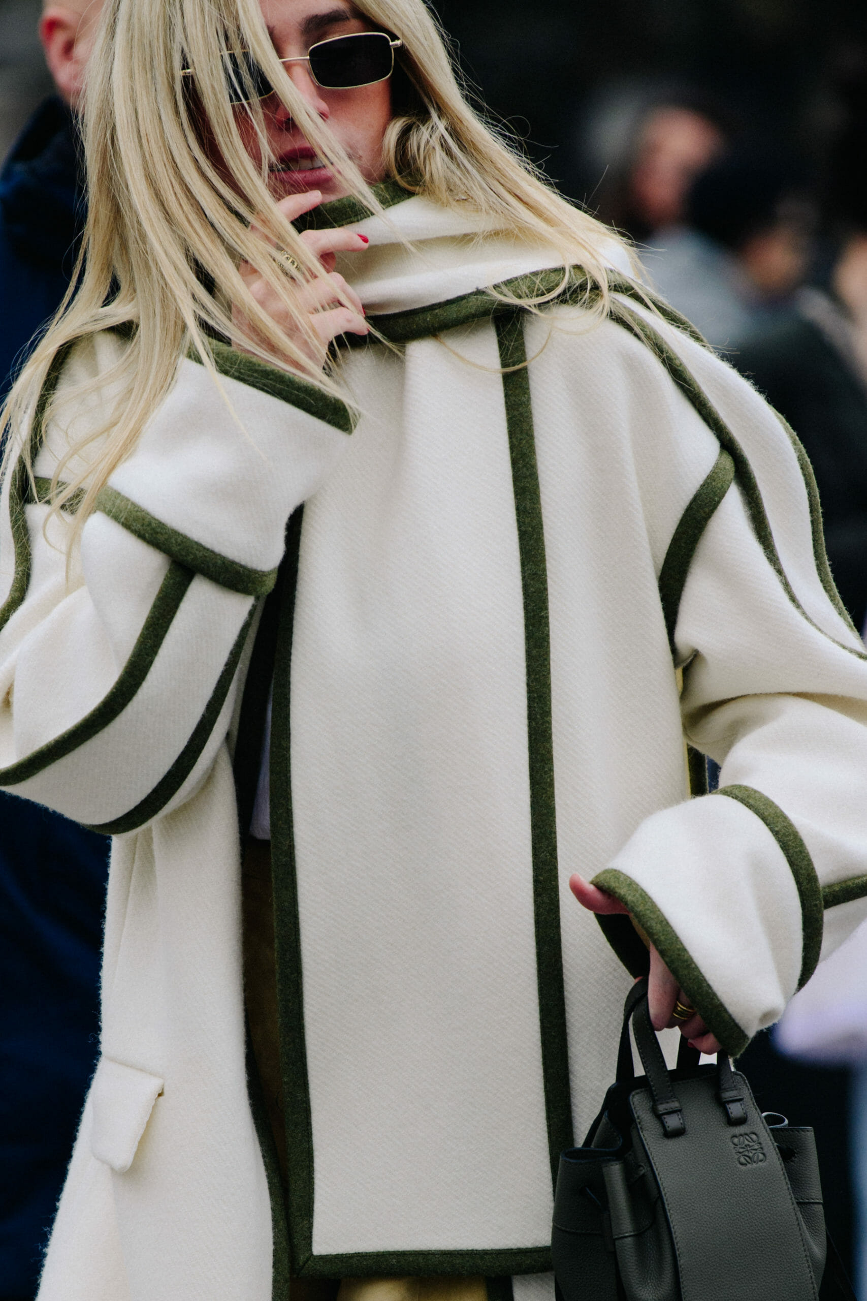 Woman wearing white coat