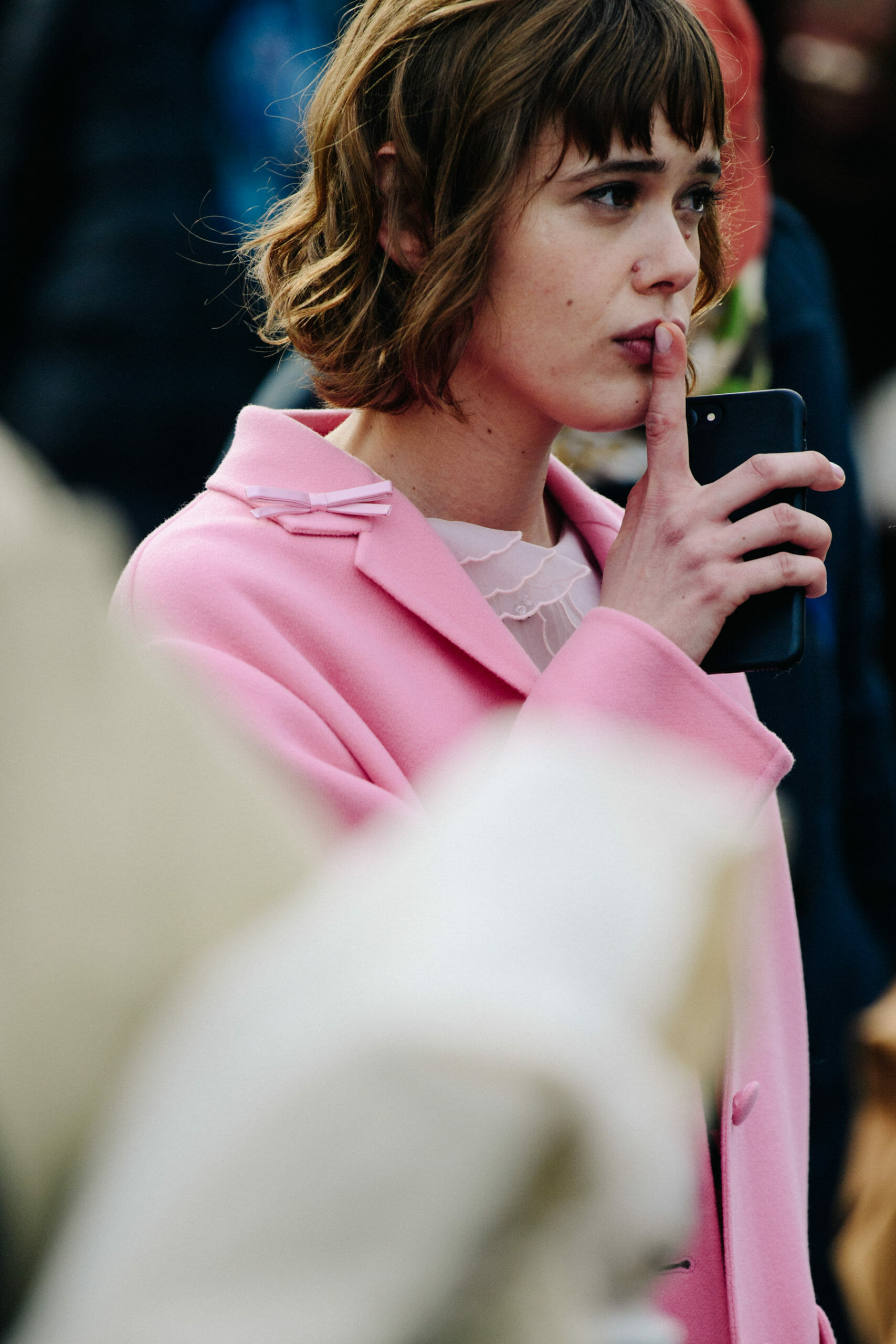 Woman wearing pink coat