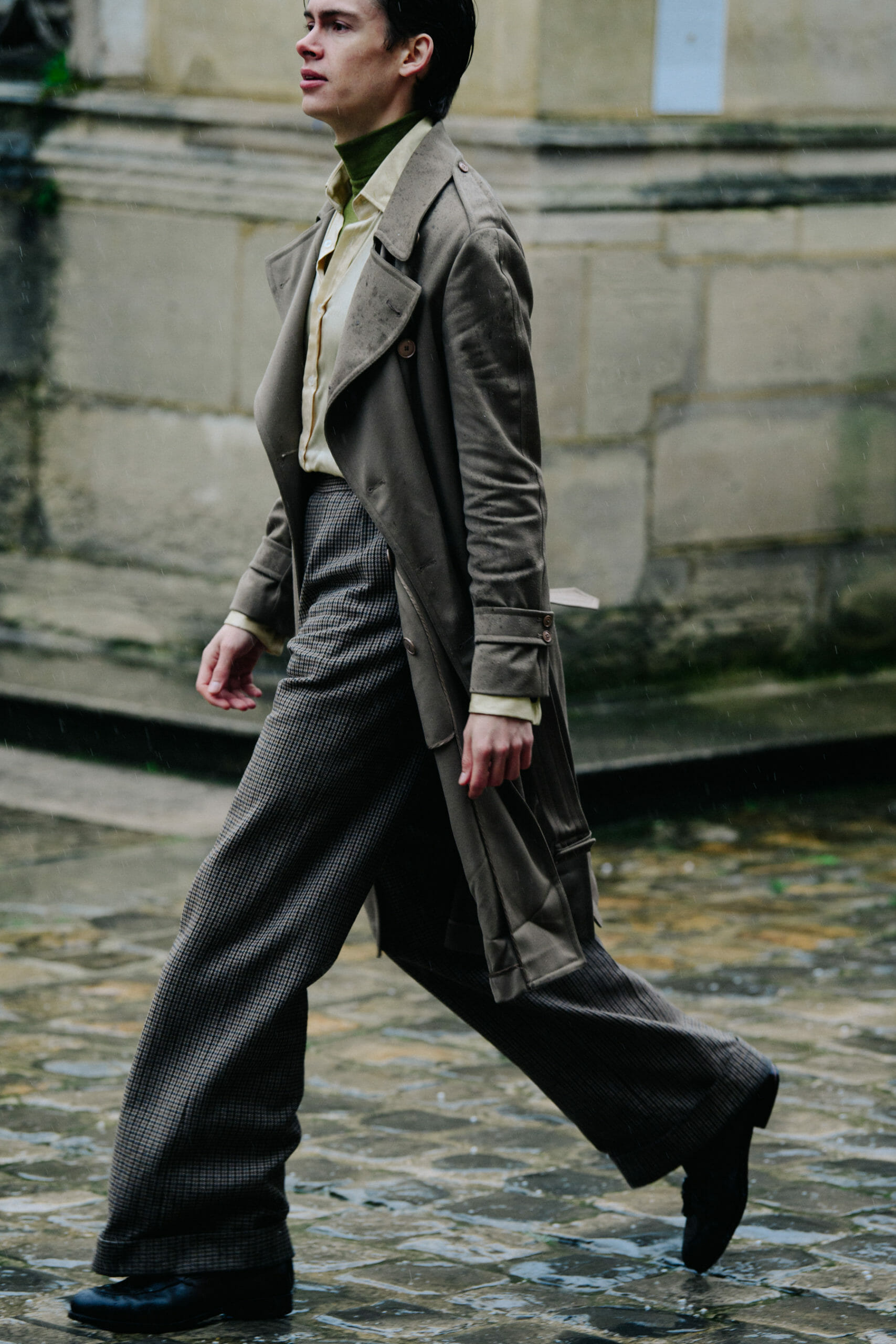 Man wearing grey coat