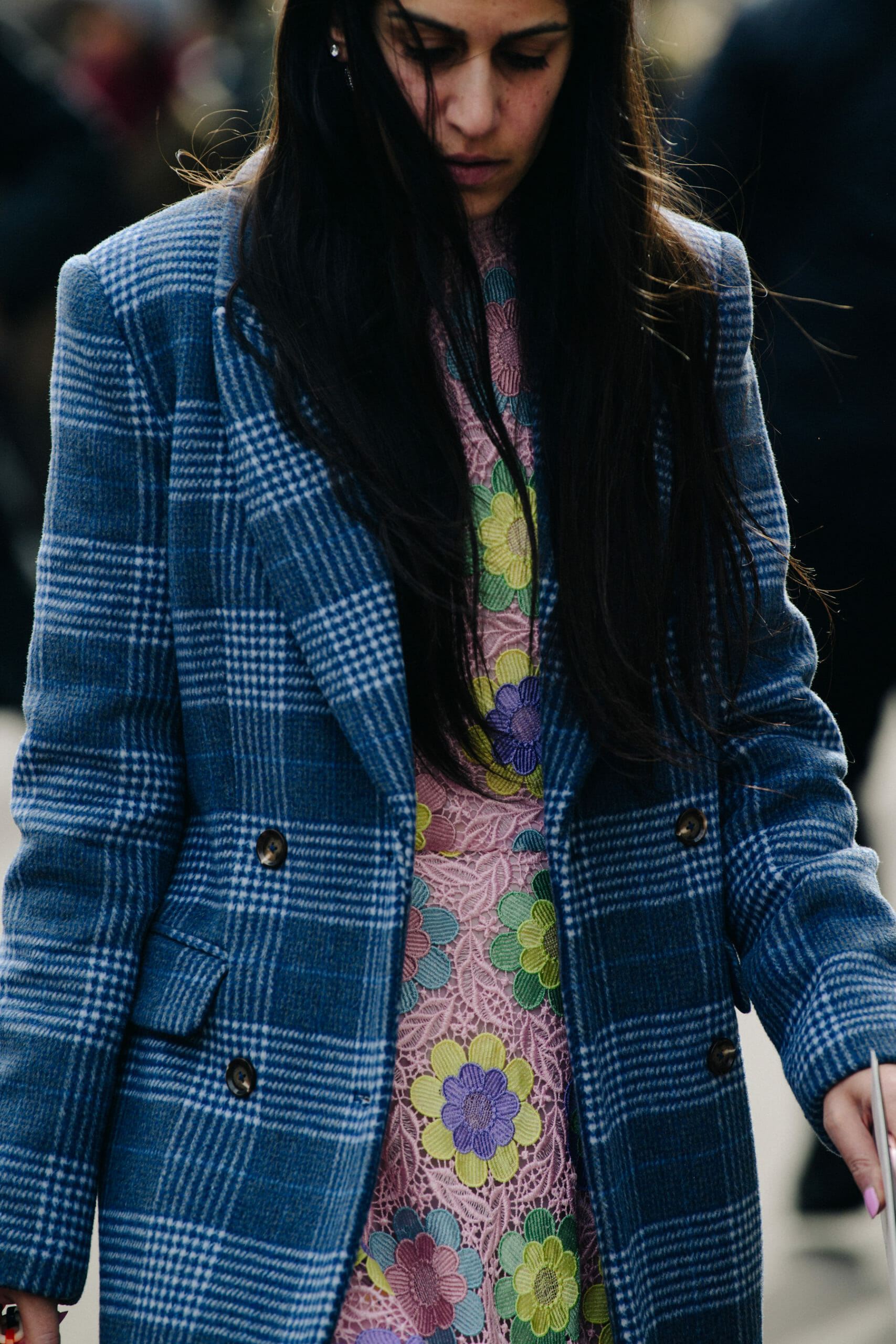 Woman wearing check coat