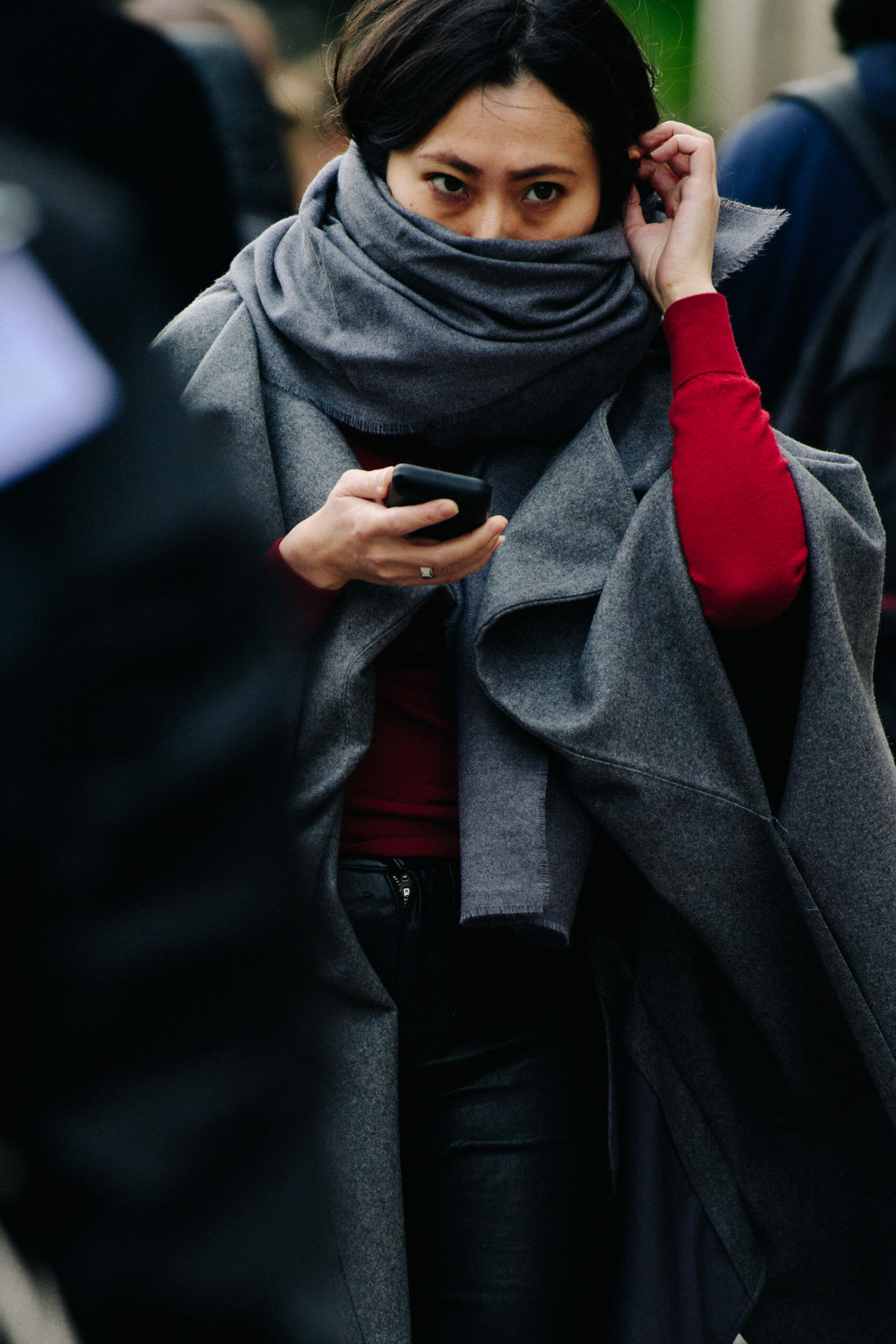 Woman wearing grey scarf
