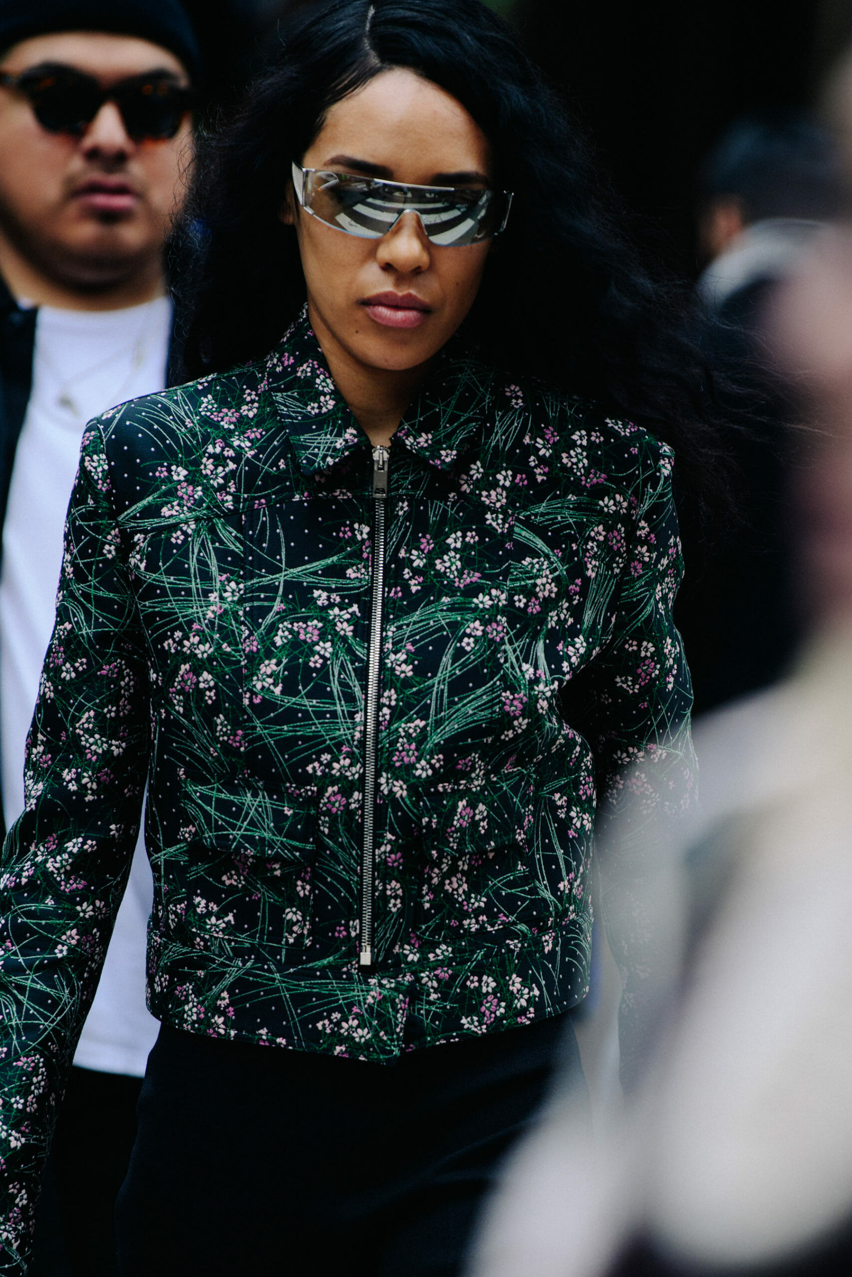 Woman wearing floral jacket