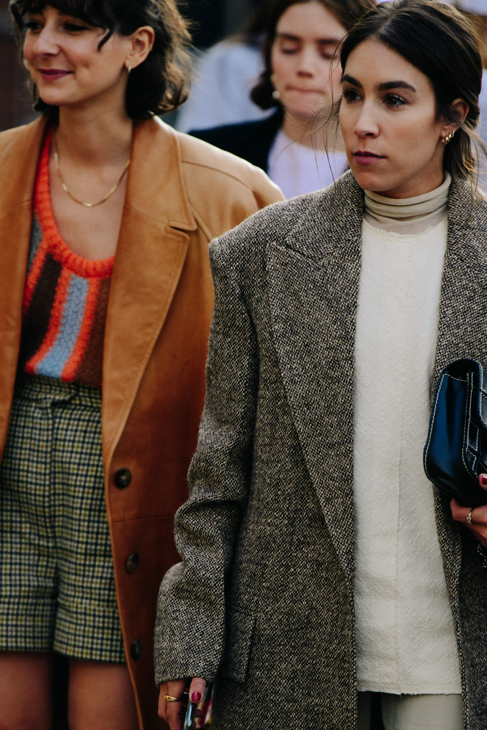 Women wearing long coats