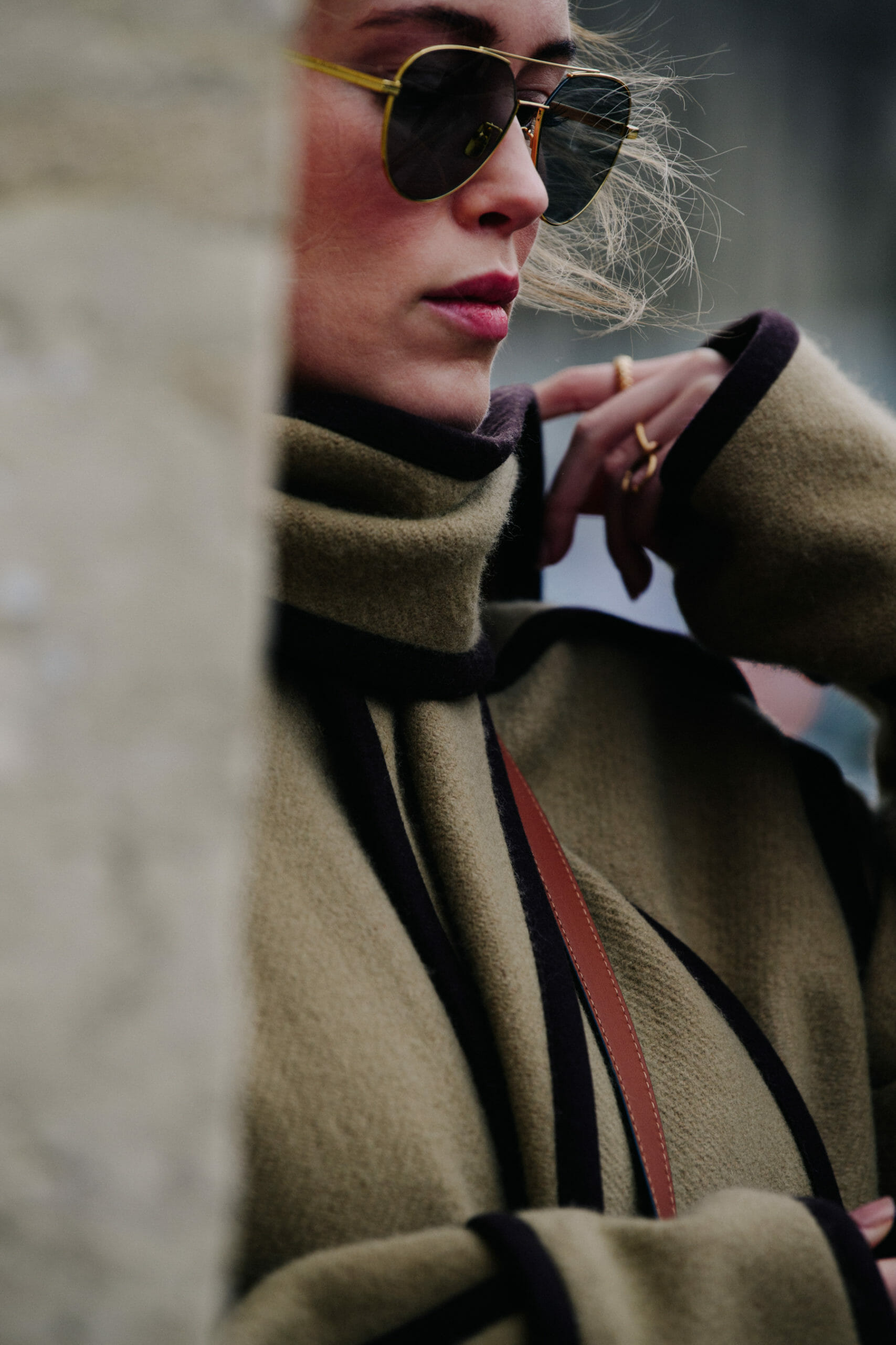 Woman wearing tan wool coat