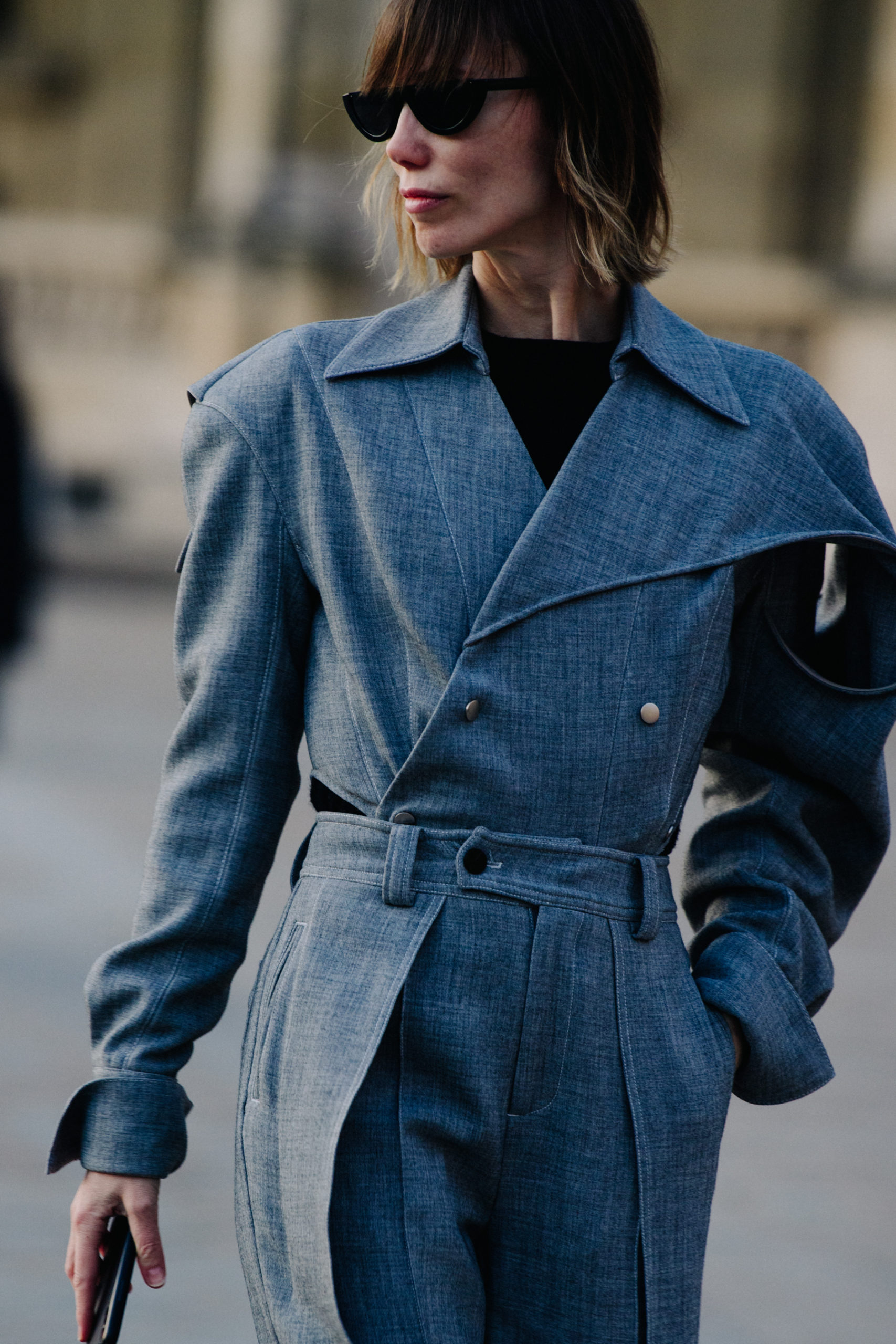 Woman wearing grey coat