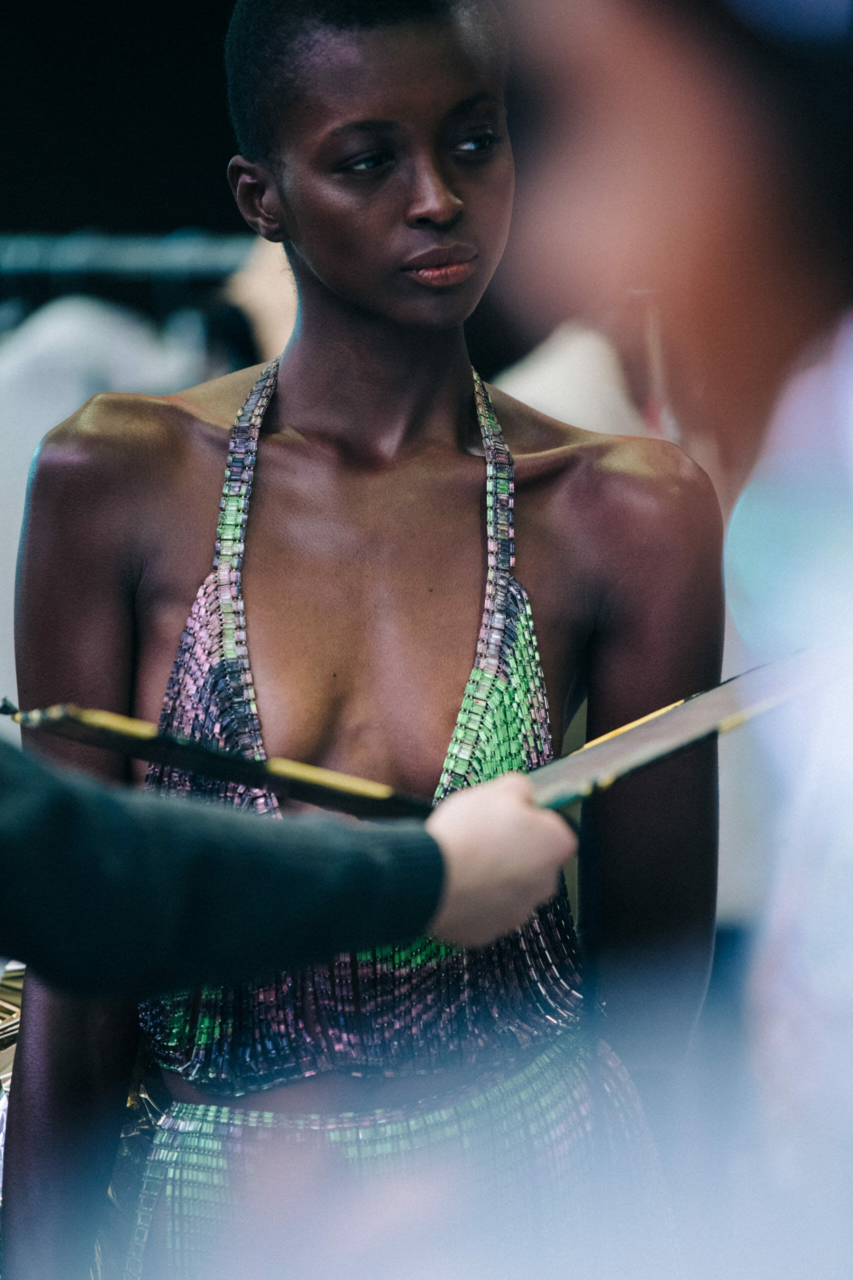 Model wearing colourful outfit