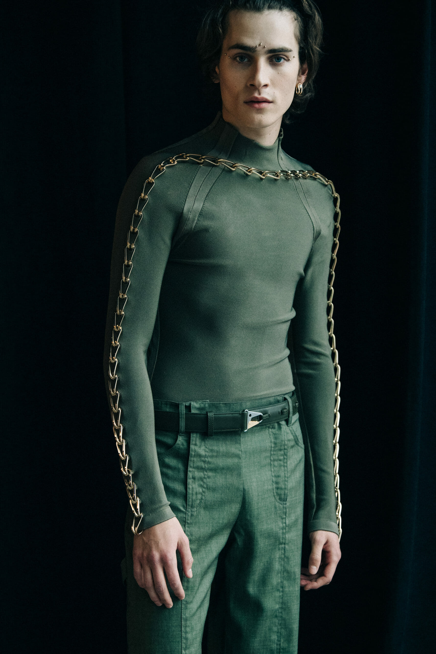 Model wearing green Dion Lee outfit