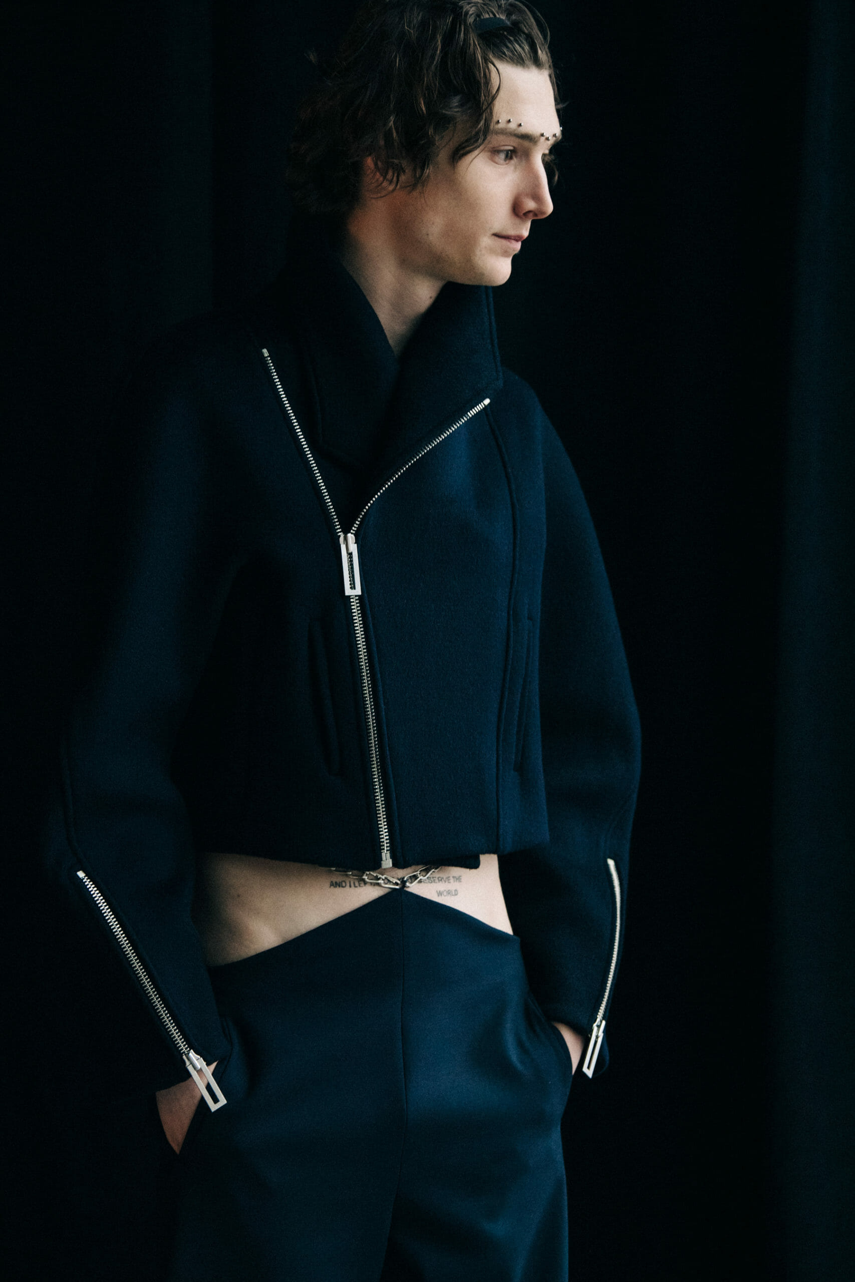 Model wearing black Dion Lee outfit