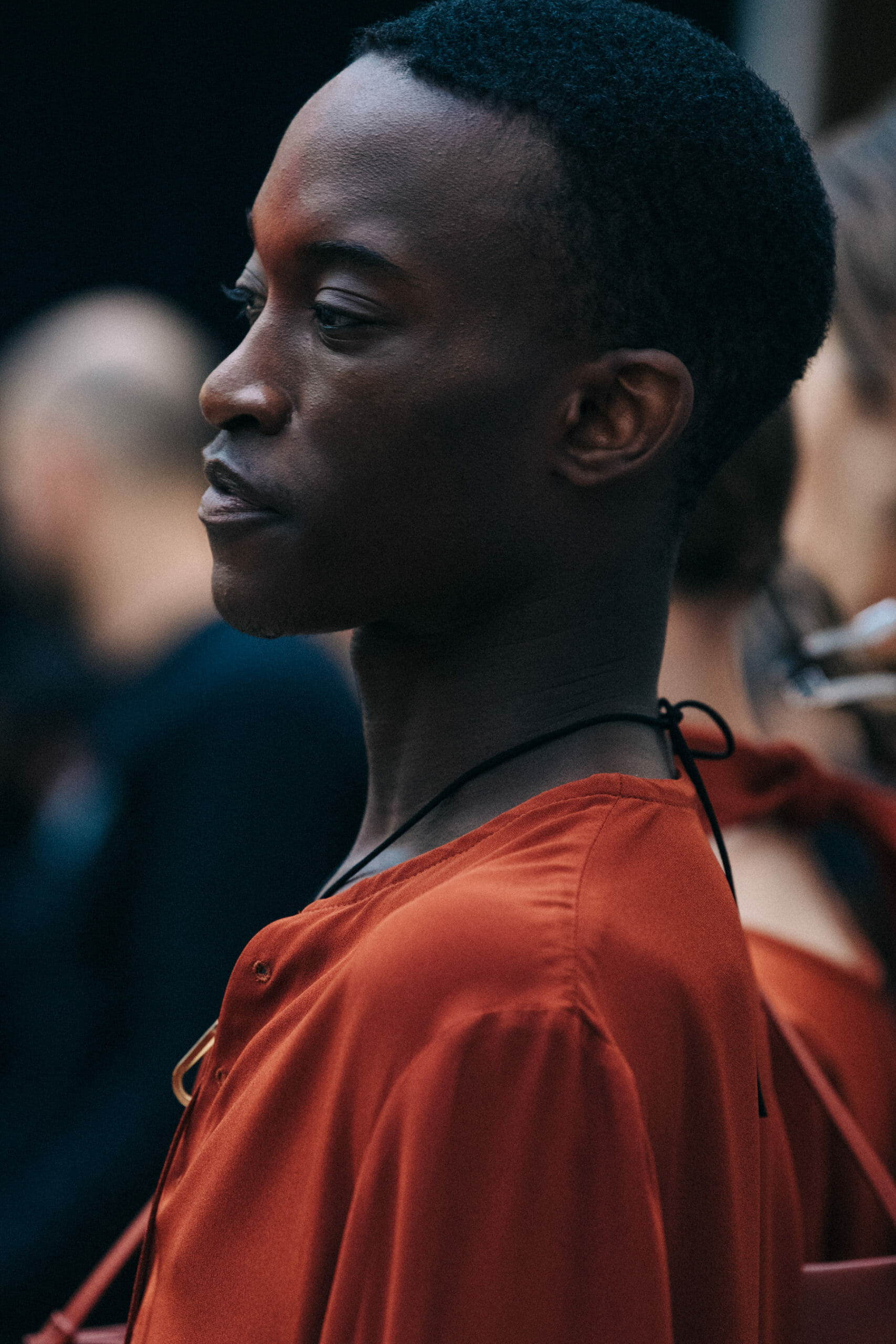 Model wearing orange Dion Lee outfit