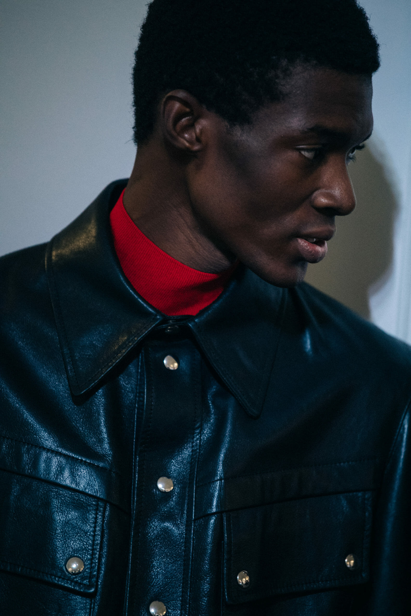 Model wearing black jacket at Givenchy