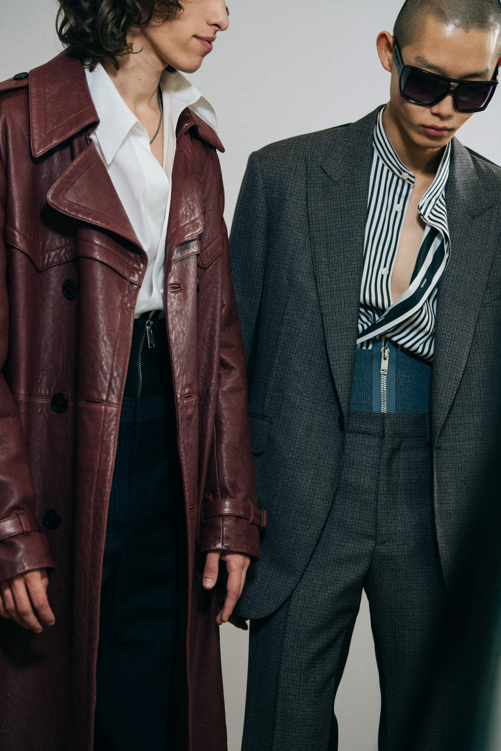 Model wearing grey suit jacket