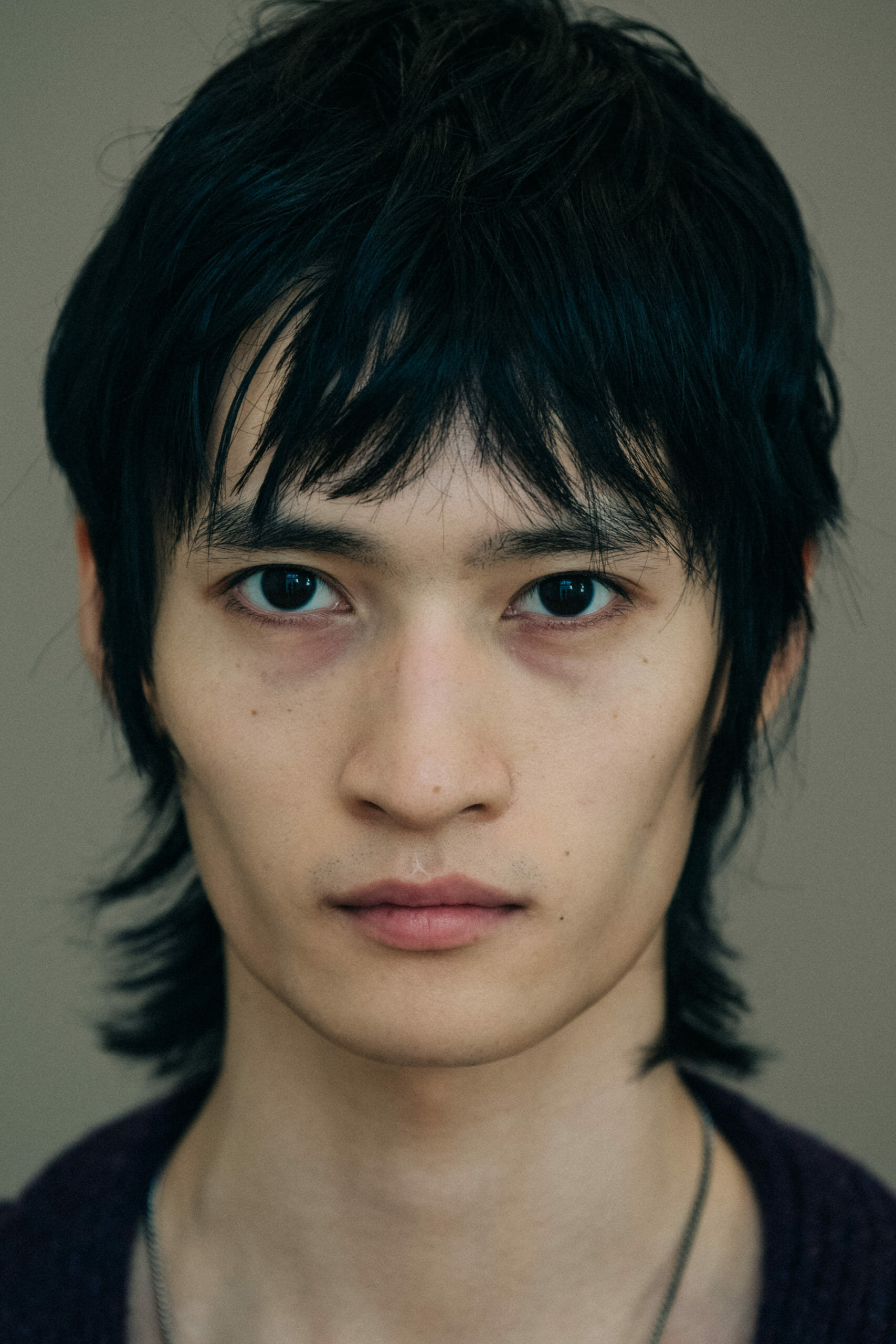 Model wearing black jacket at Givenchy