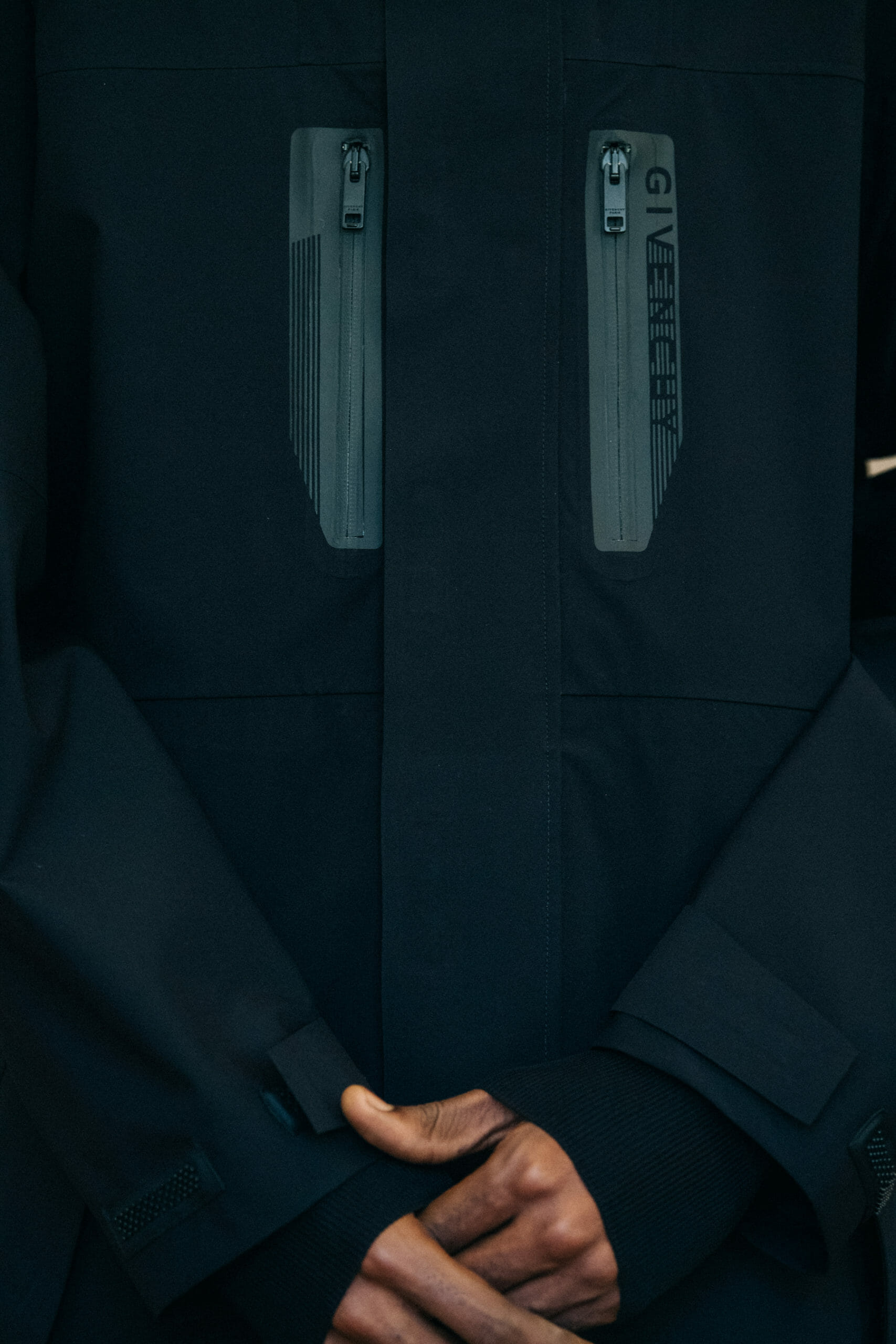 Model wearing black jacket at Givenchy