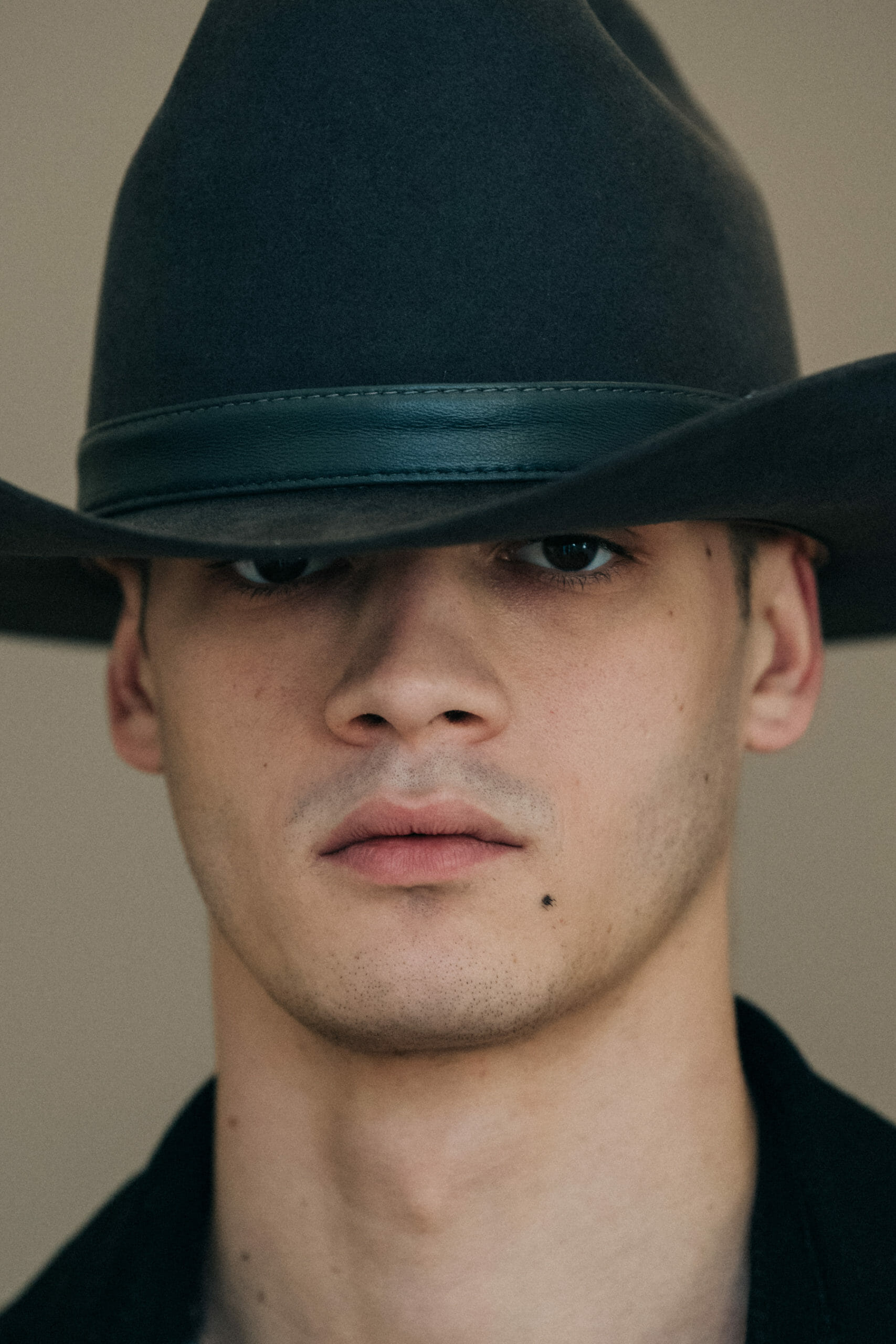 Model wearing cowboy hat at Givenchy