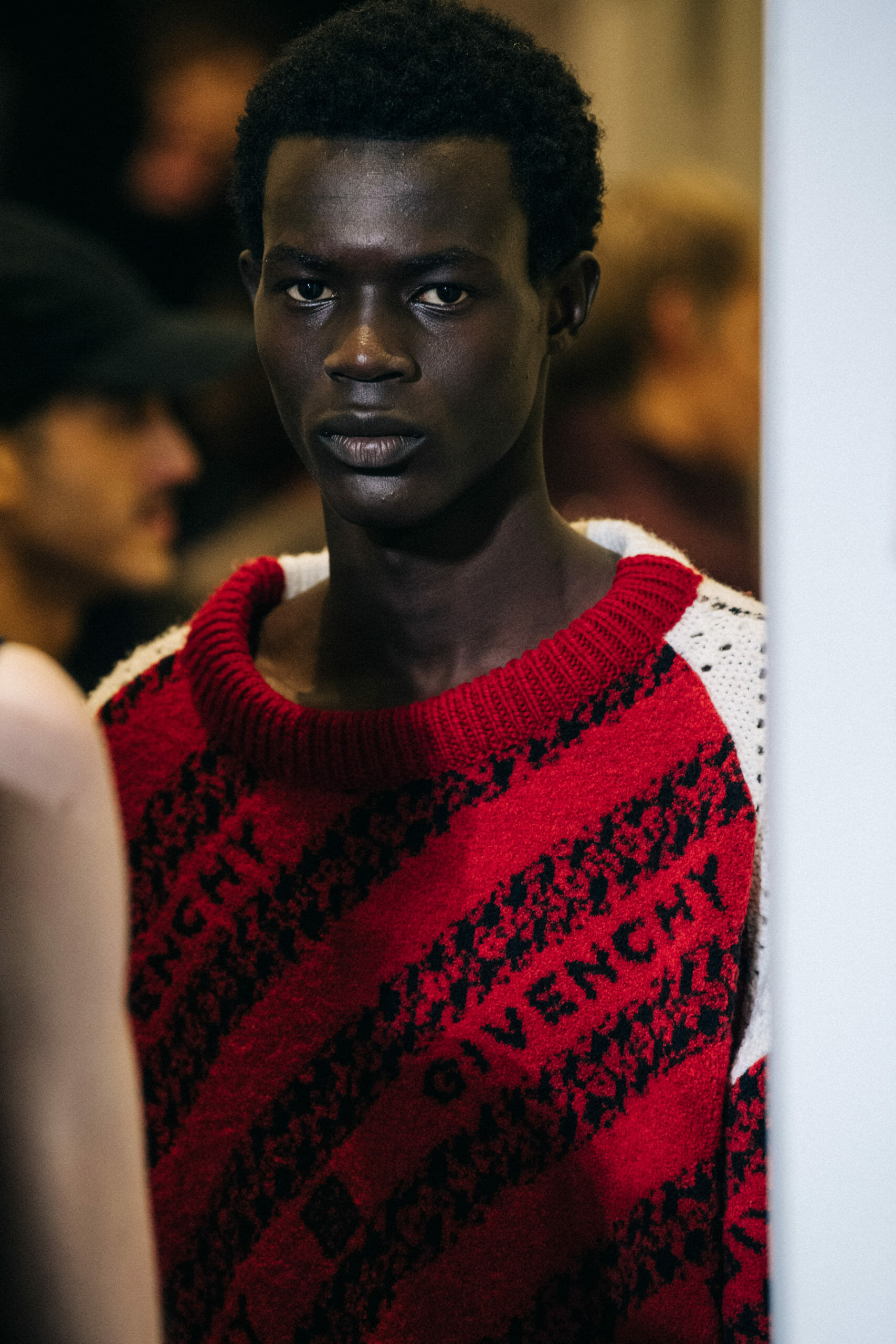 Model wearing red at Givenchy