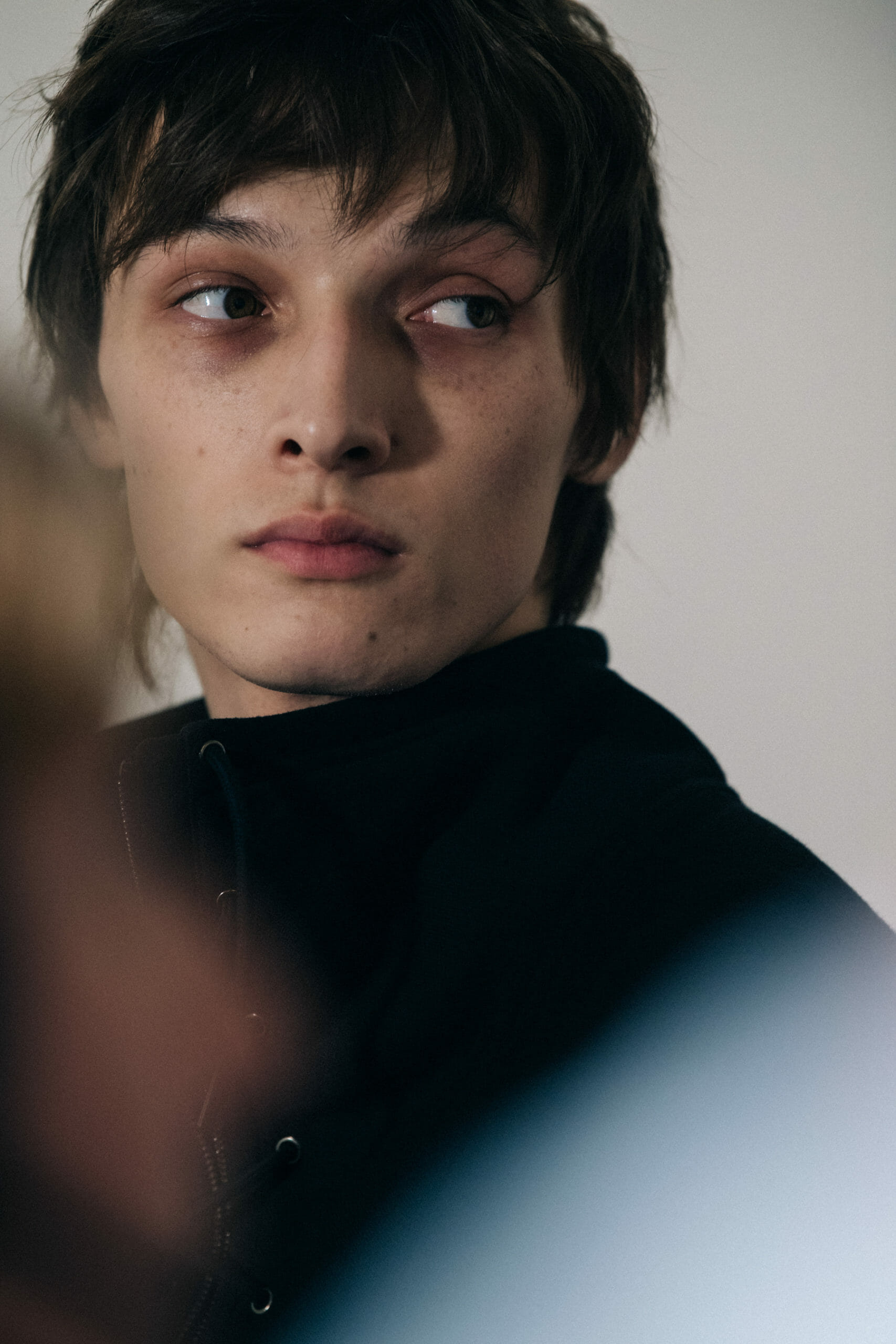 Model wearing black jacket at Givenchy