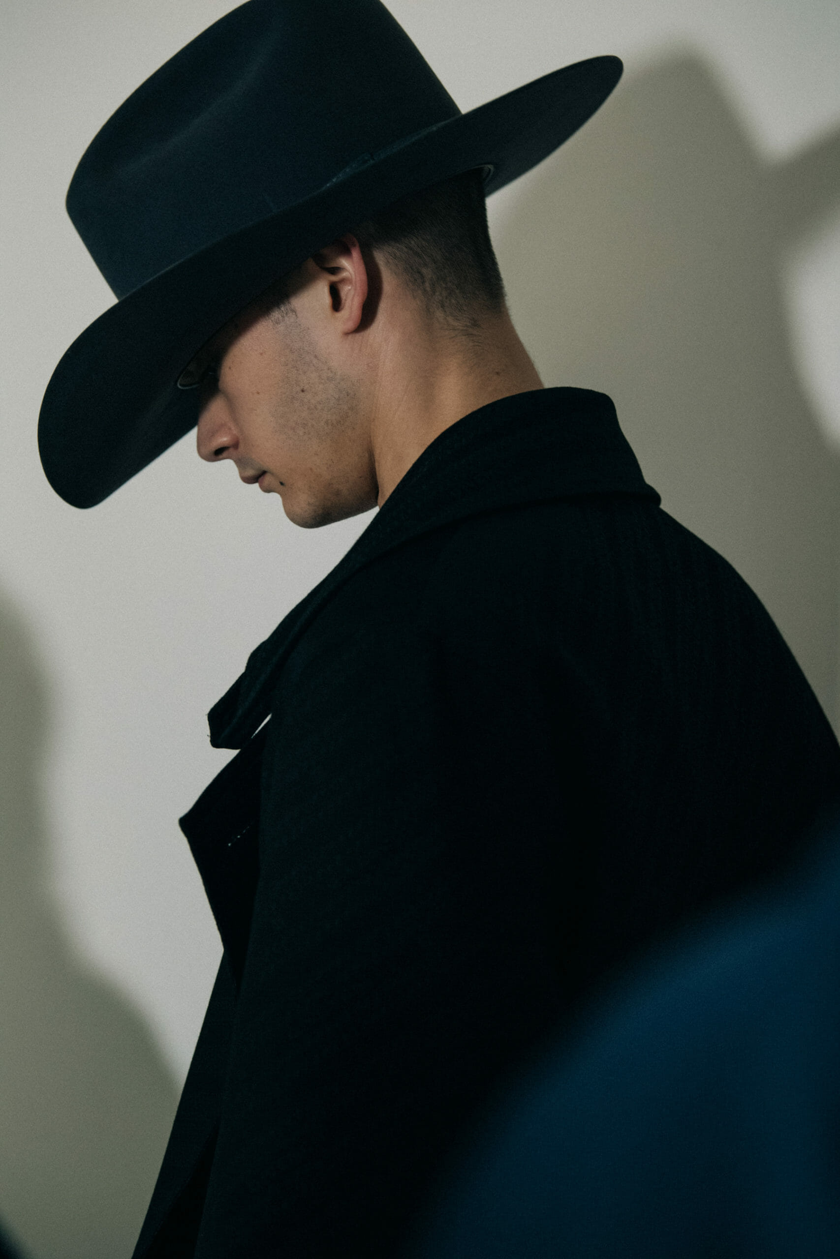 Model wearing cowboy hat at Givenchy