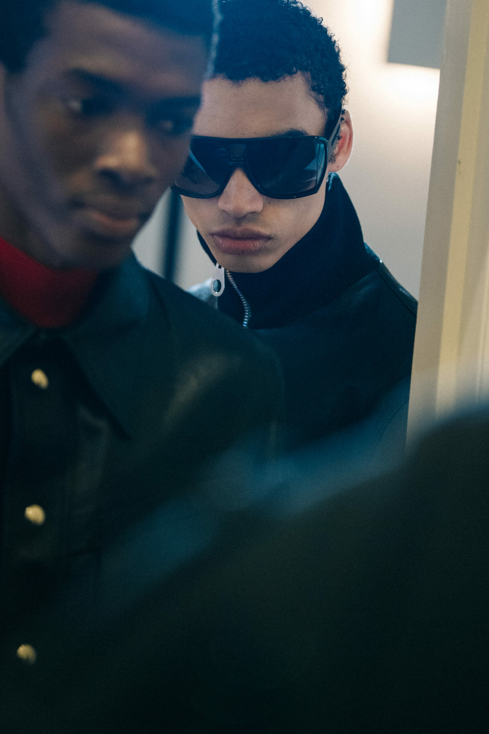 Model wearing black leather jacket