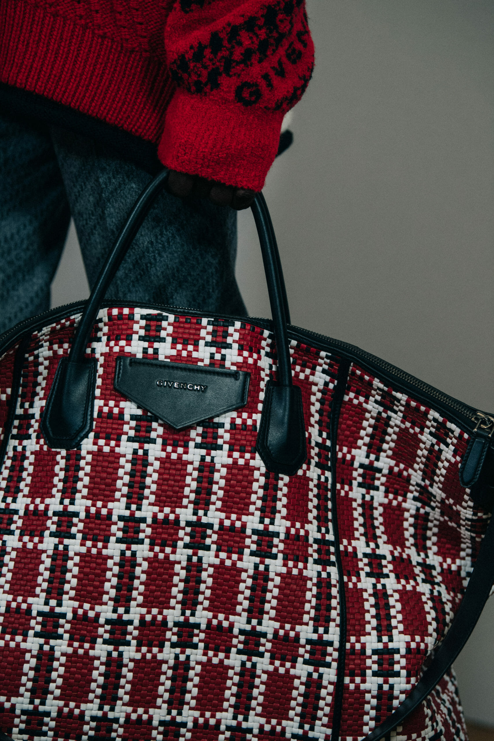 Model carrying Givenchy bag