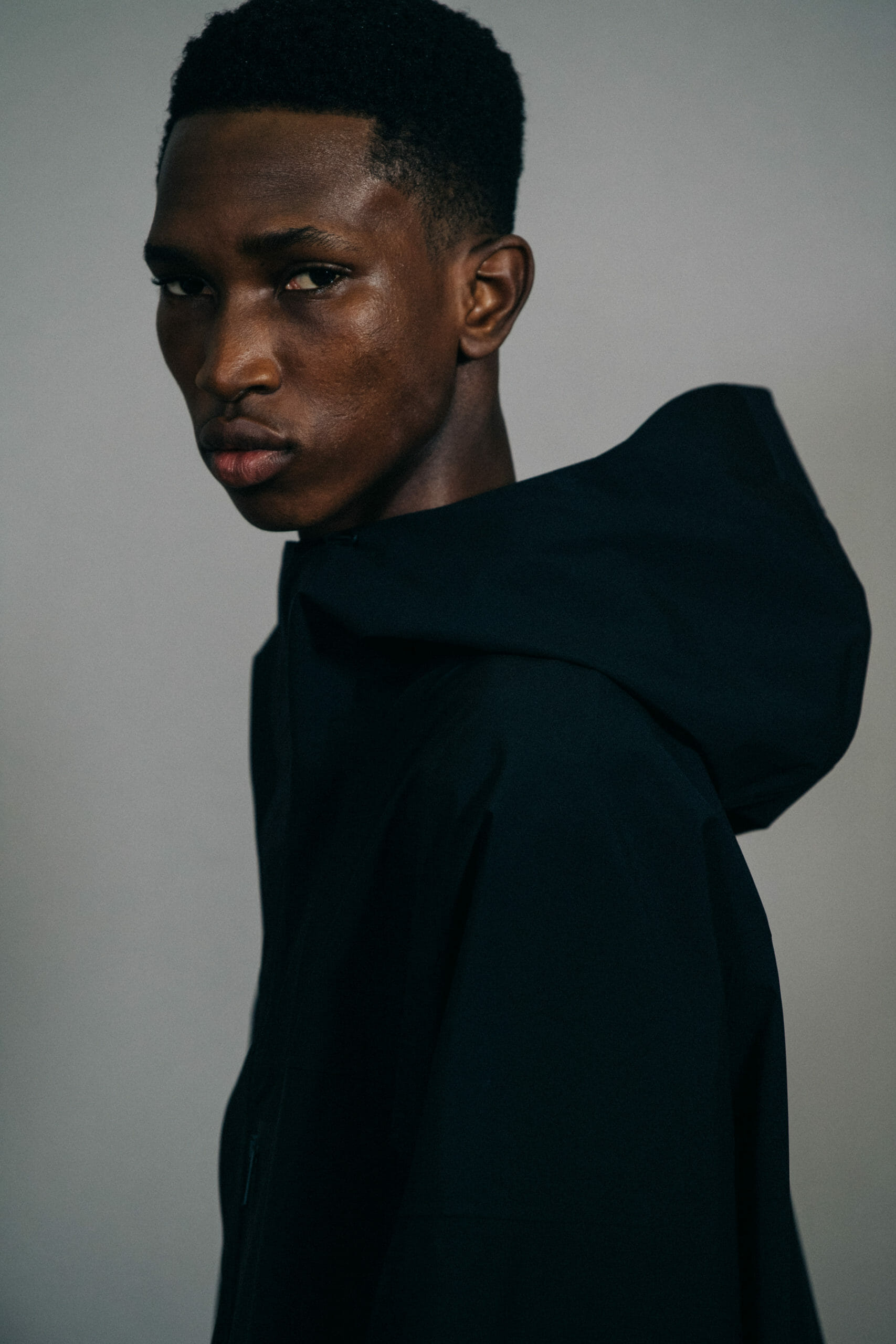 Model wearing black jacket at Givenchy