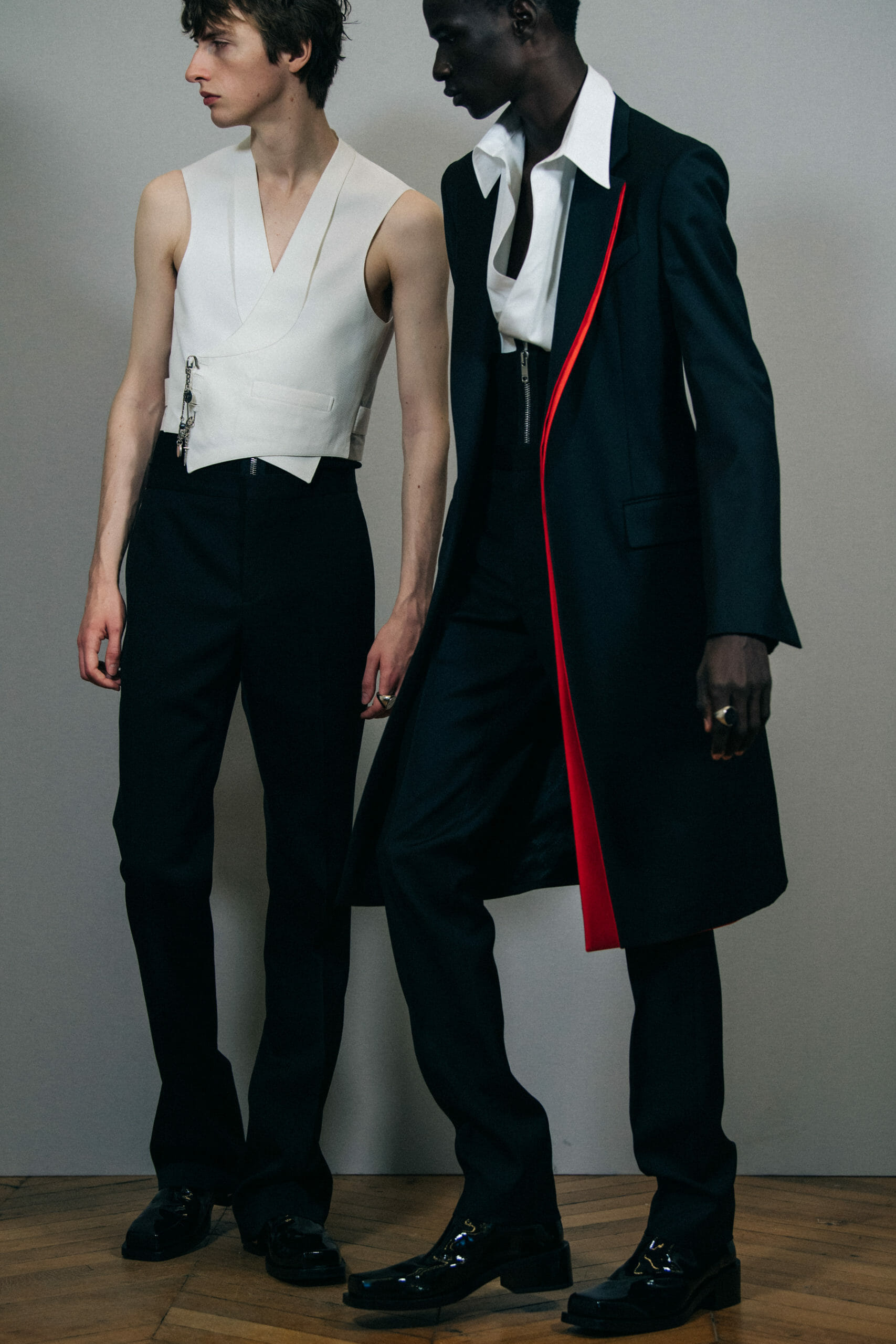 Model wearing long black coat