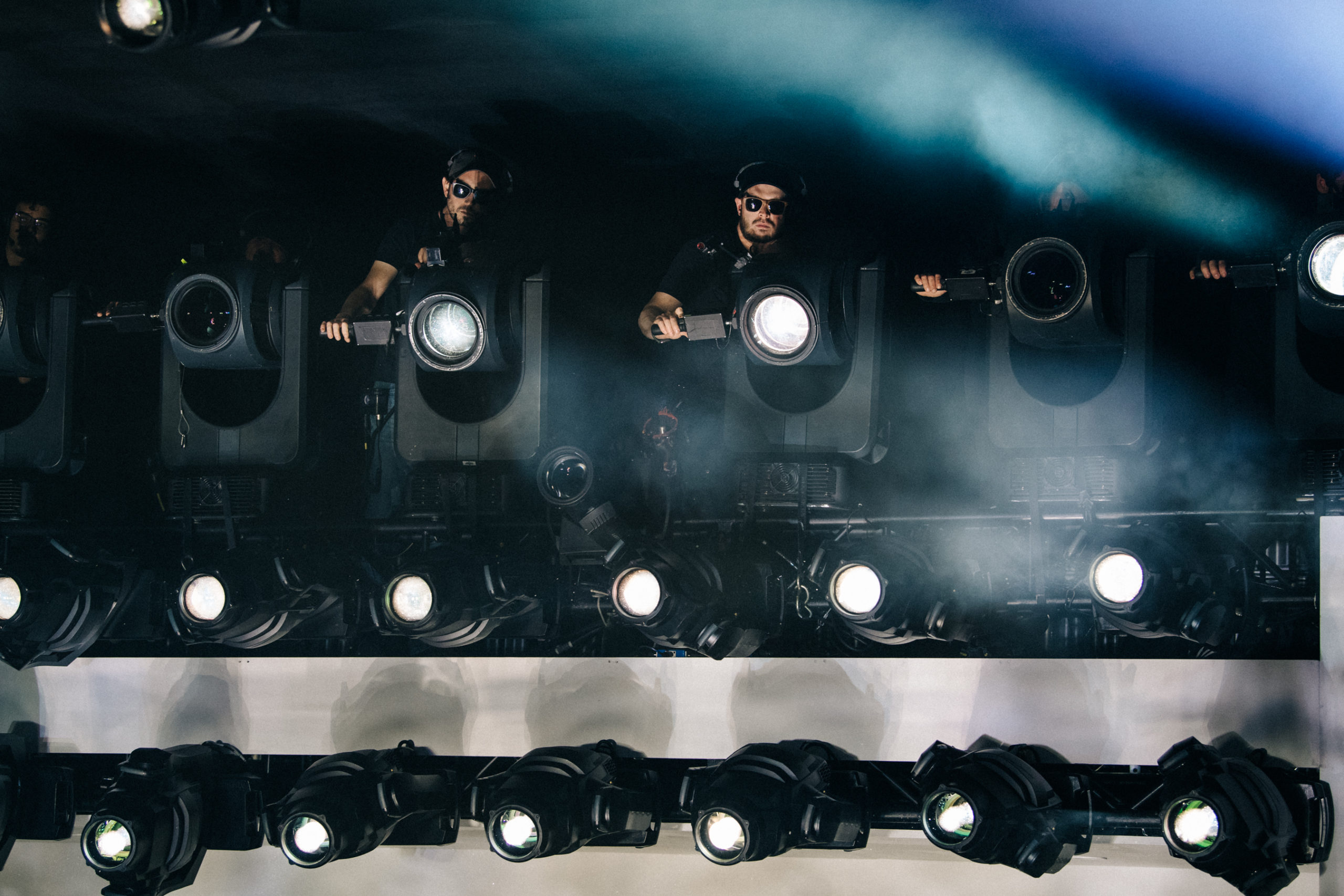 Crew members using lights