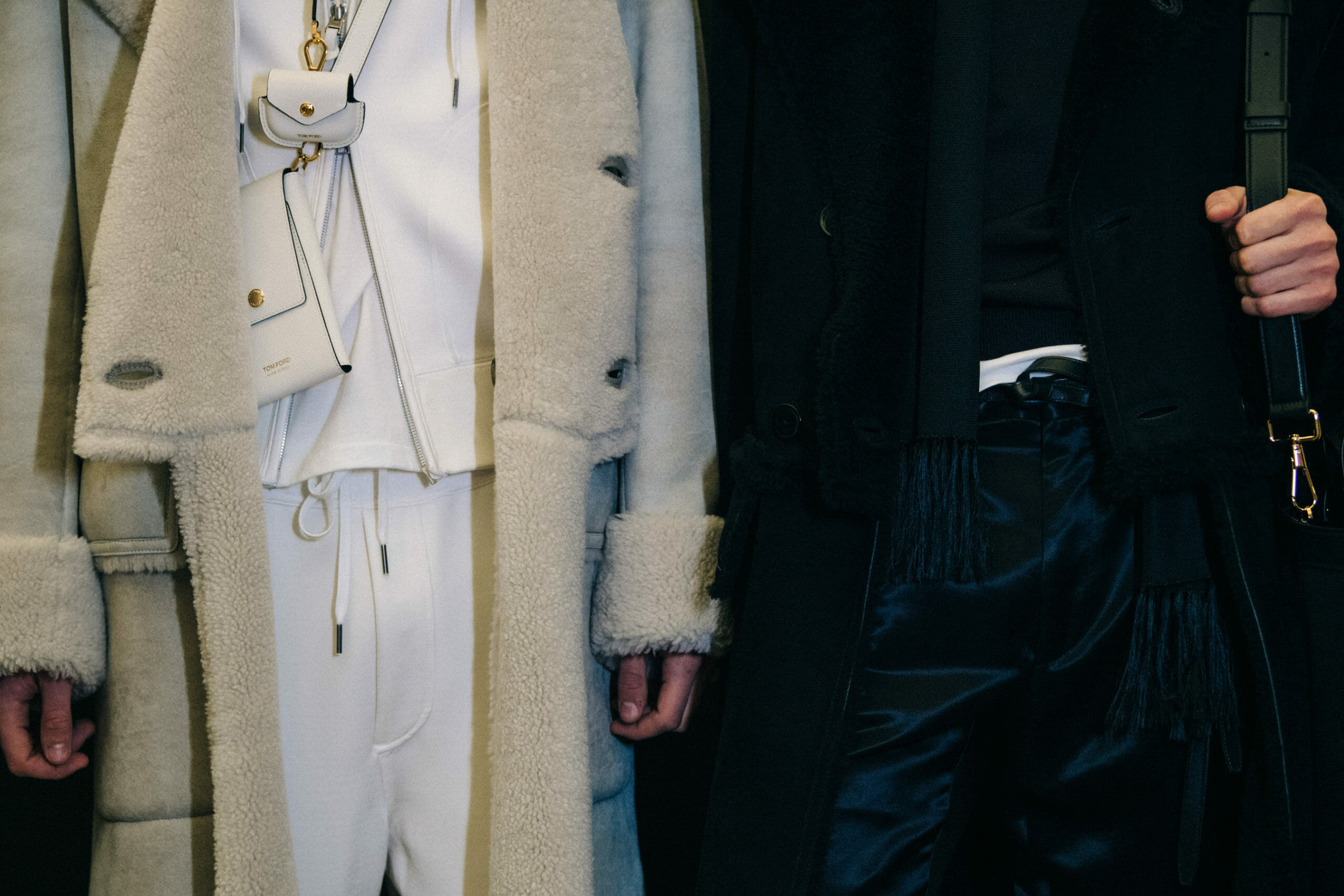 Models wearing contrasting outfits
