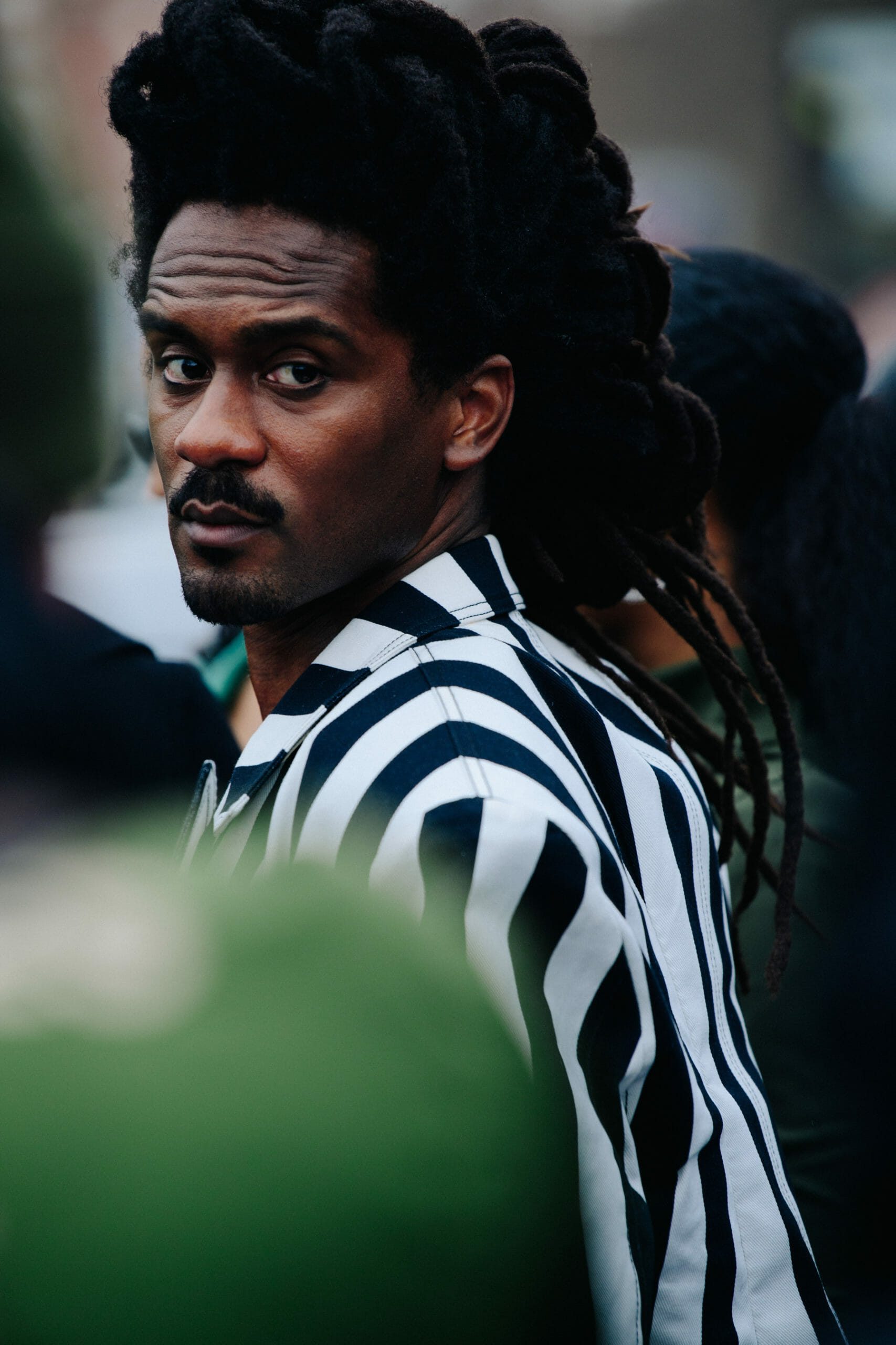 Man wearing striped jacket