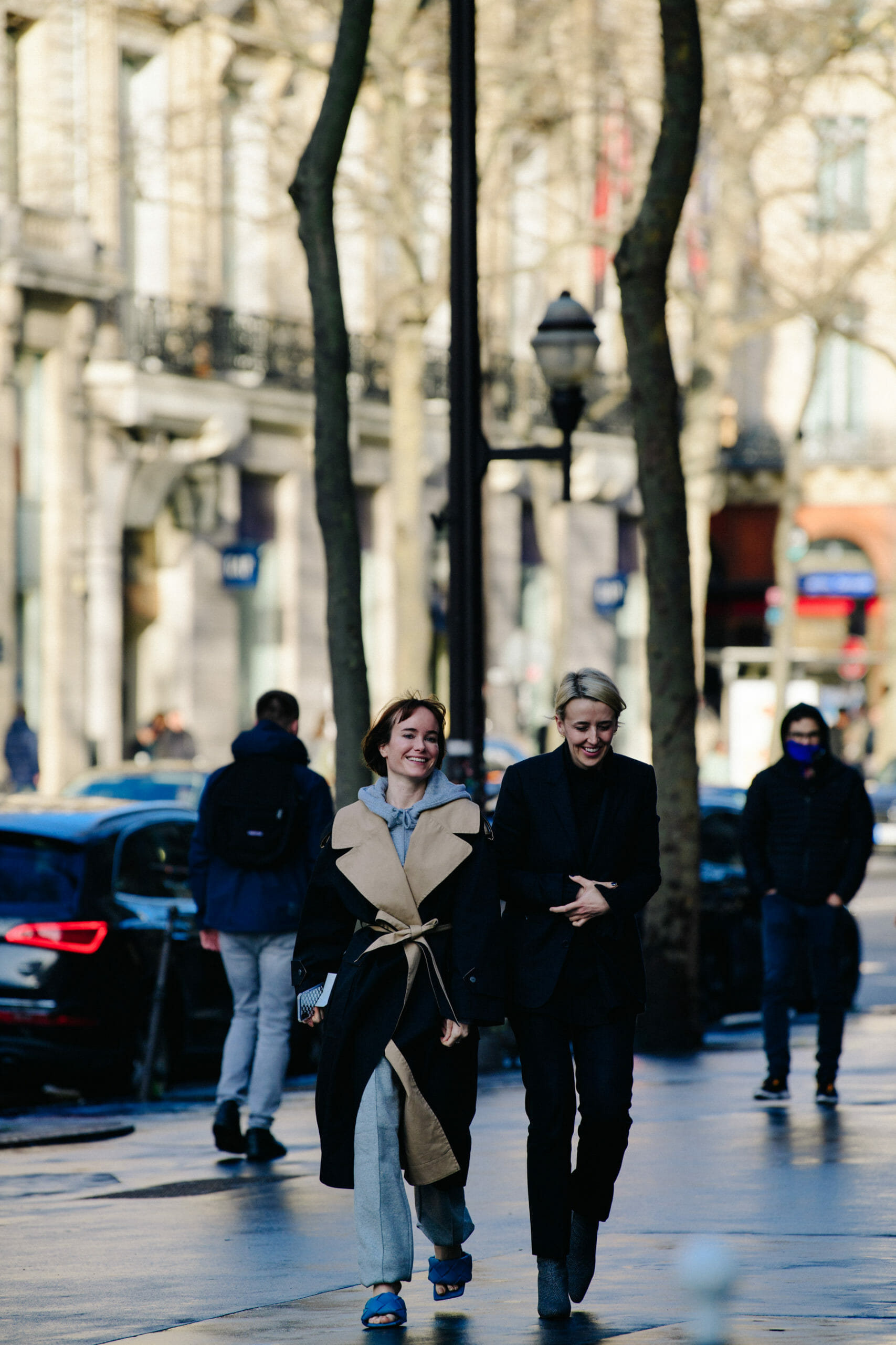 Two women wearing winter coats