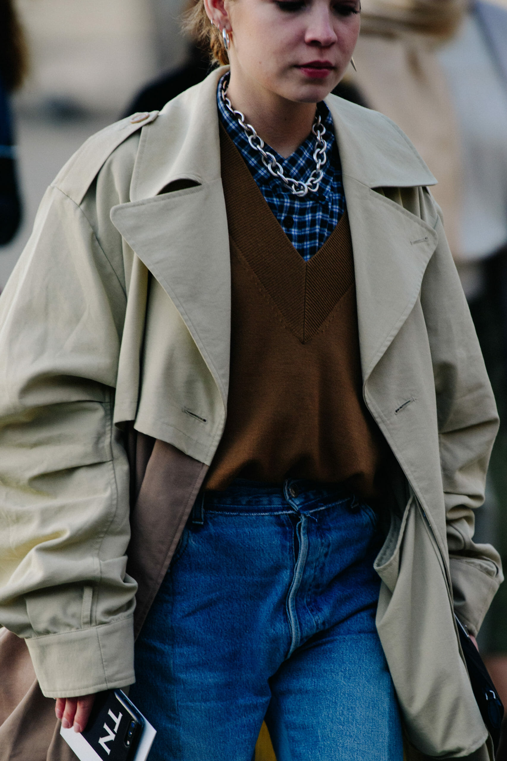 Woman wearing brown jumper