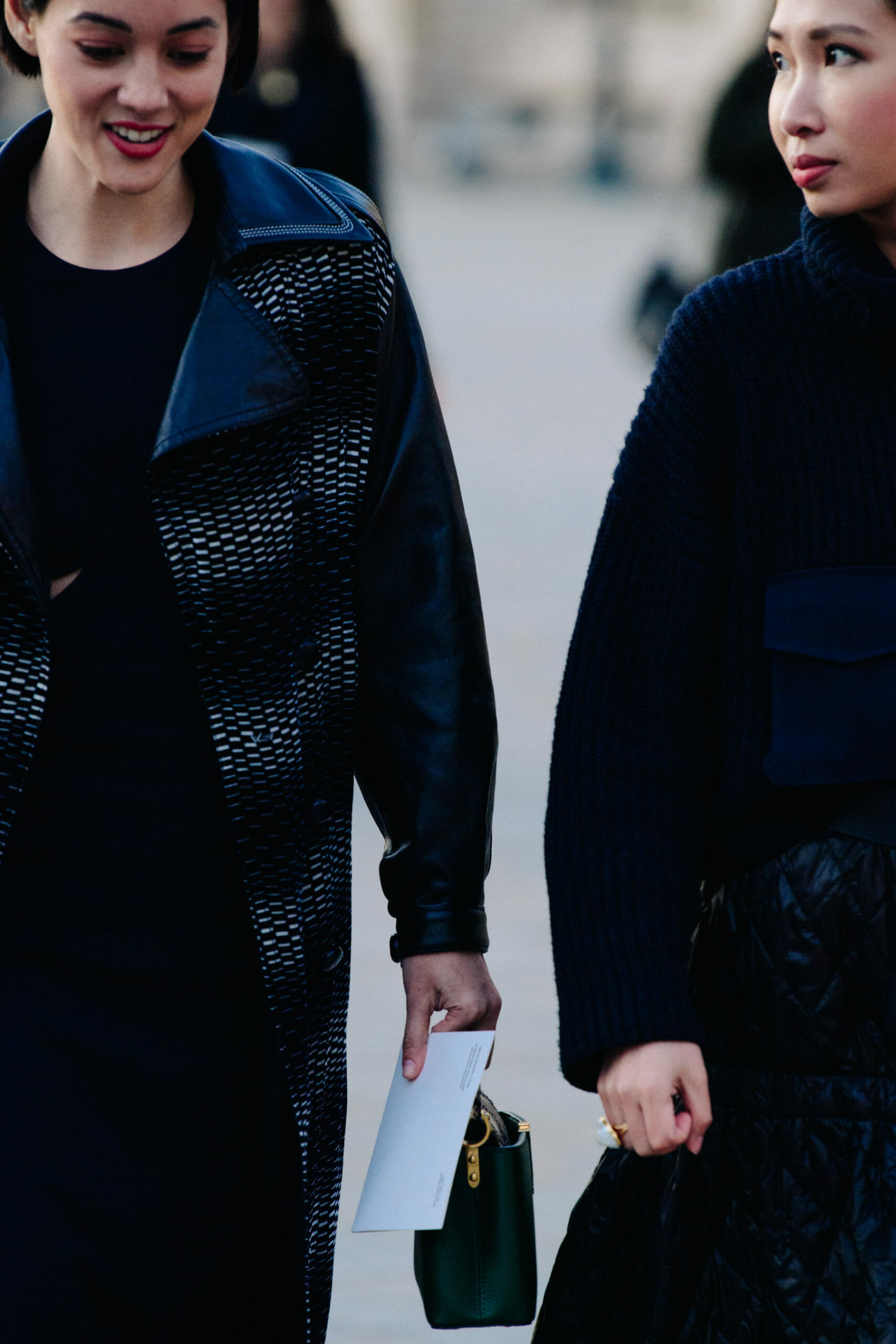 Women wearing long winter coats