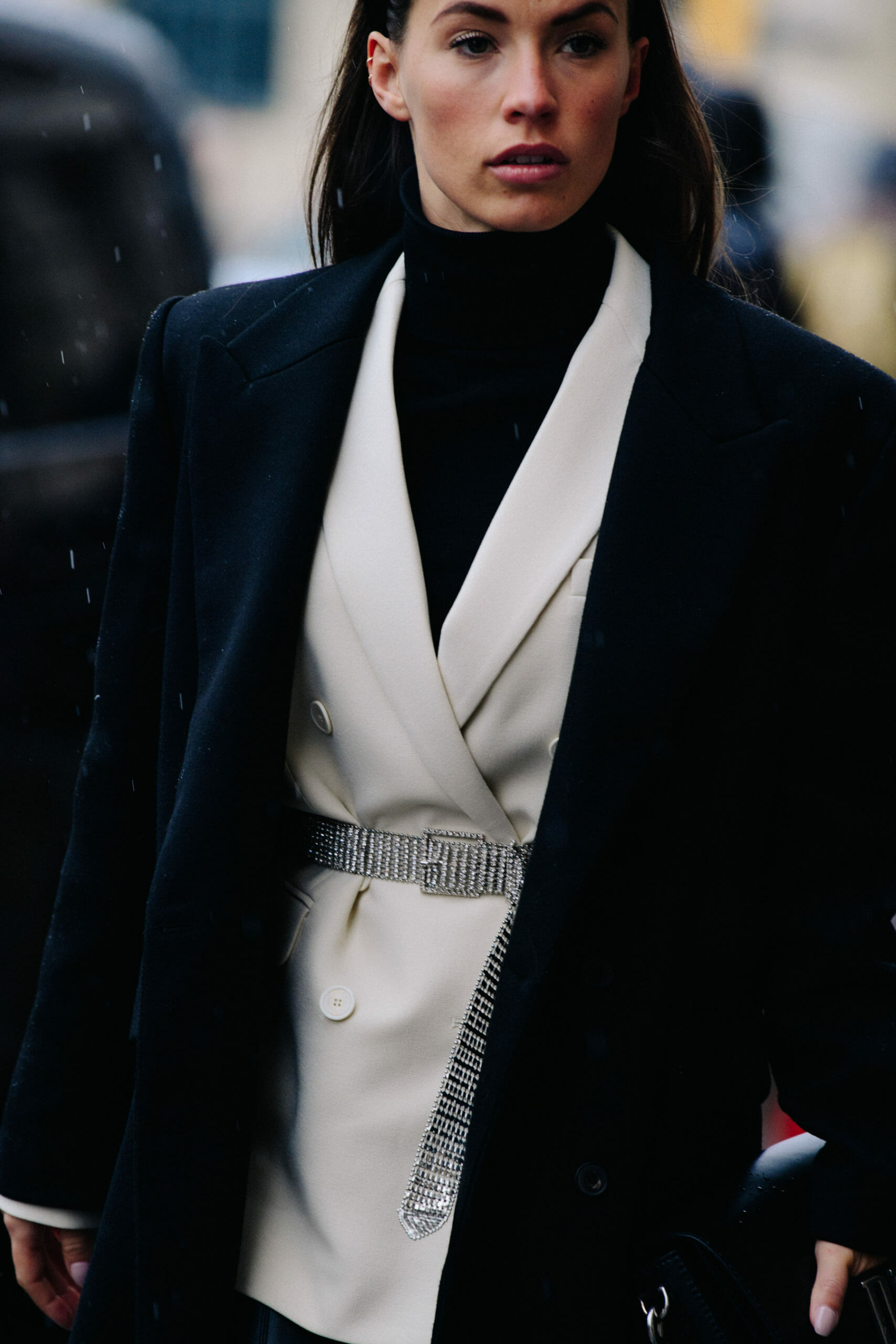 Woman wearing silver belt