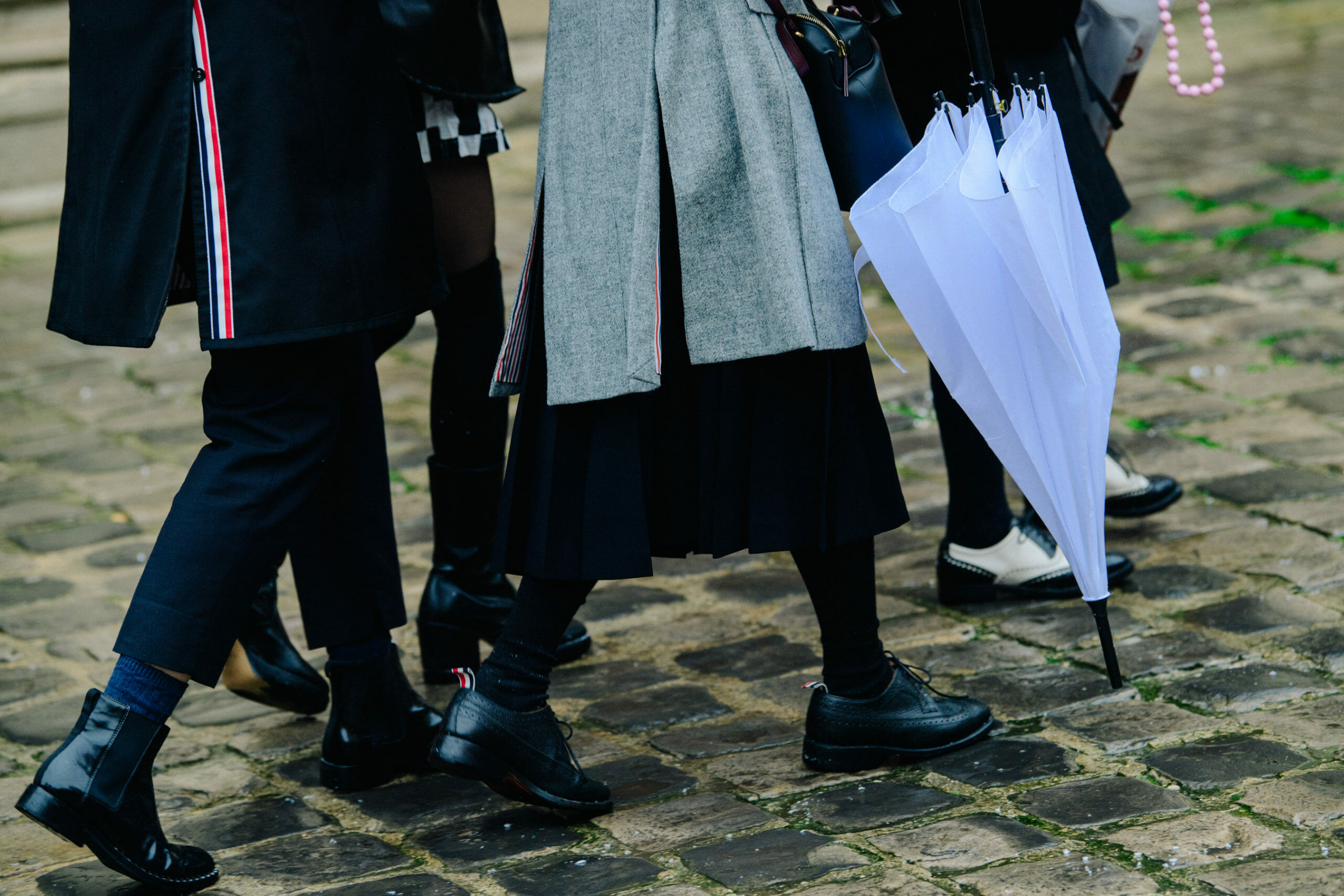 People wearing Thom Browne
