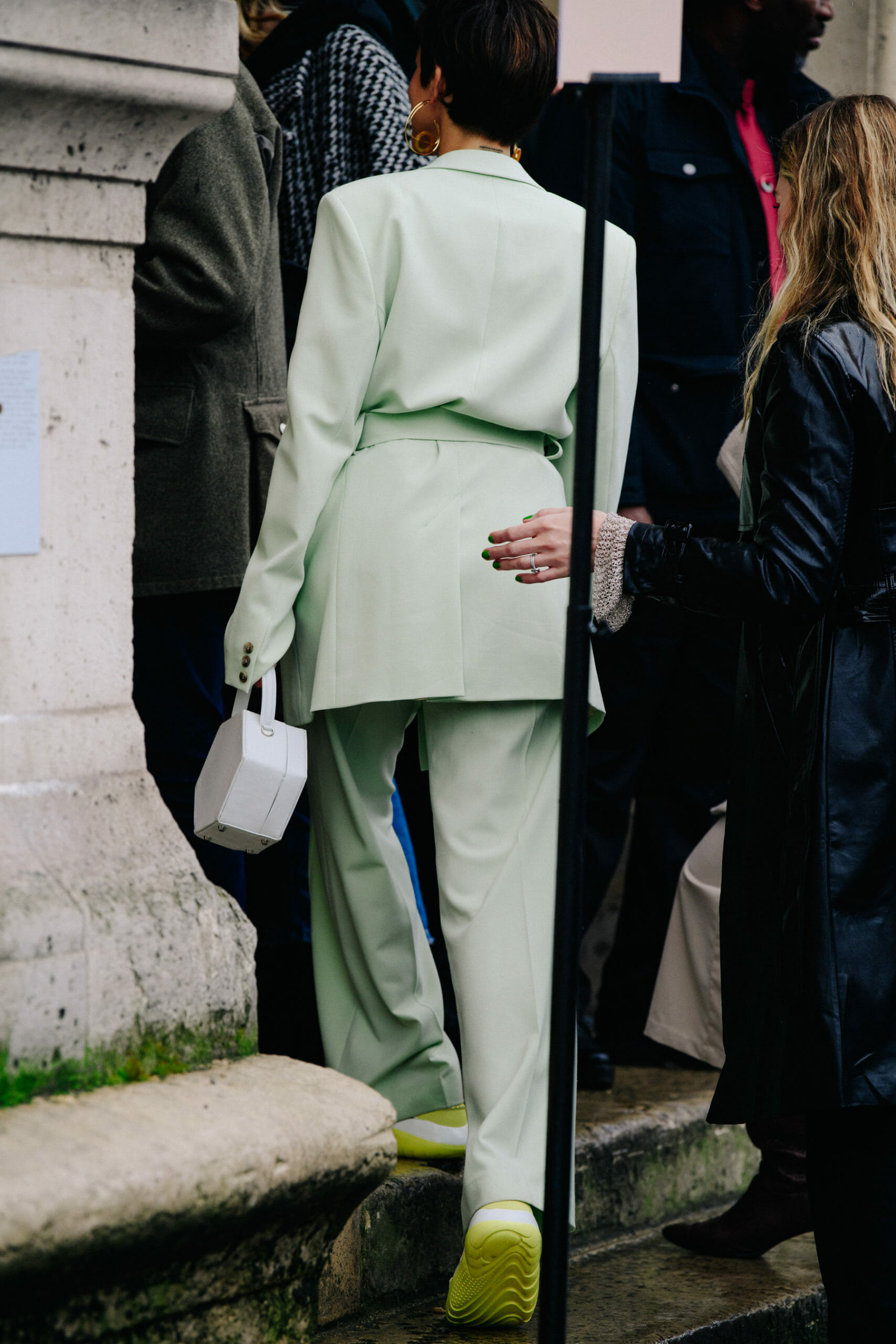 Woman wearing green suit