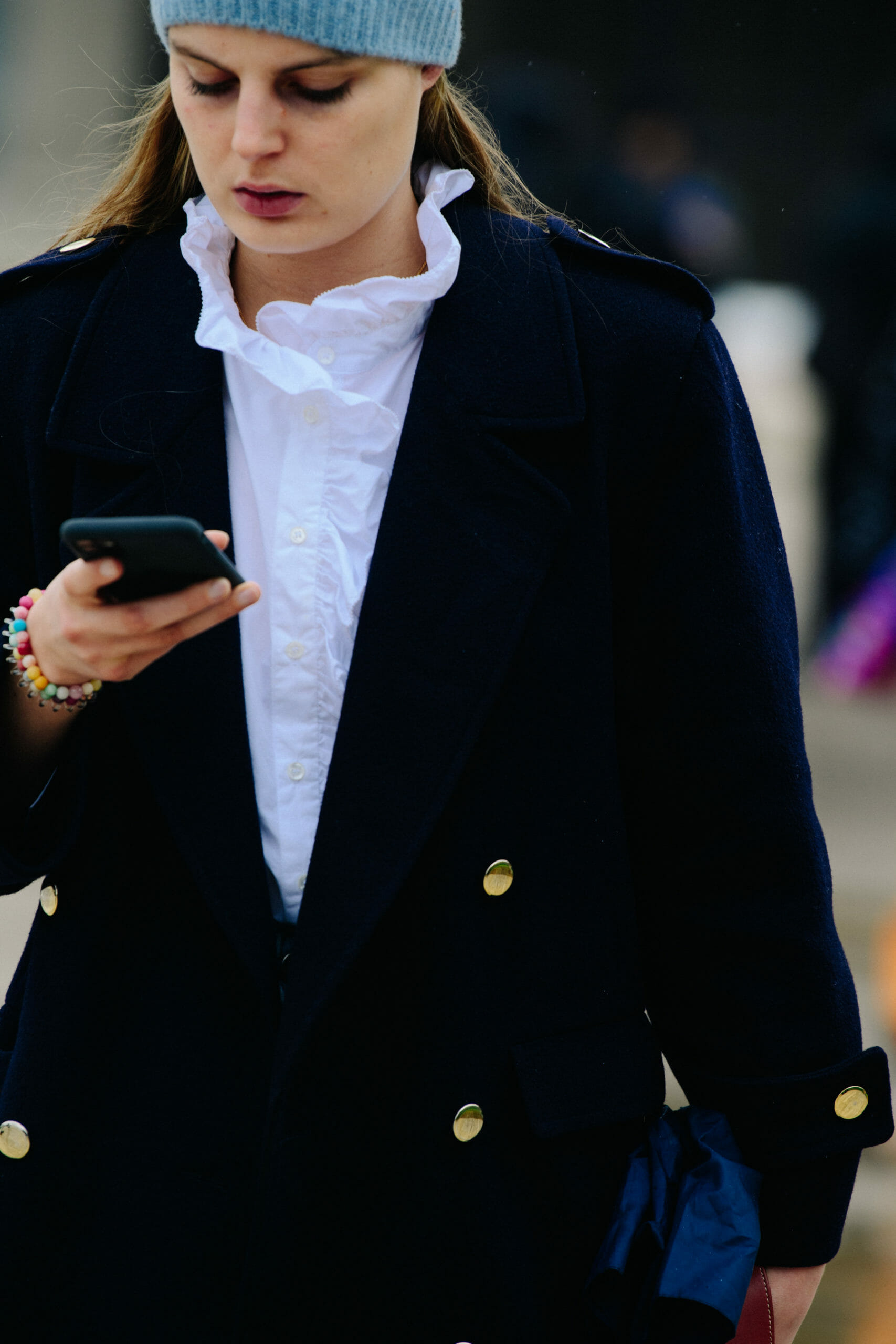 Woman wearing blue beanie