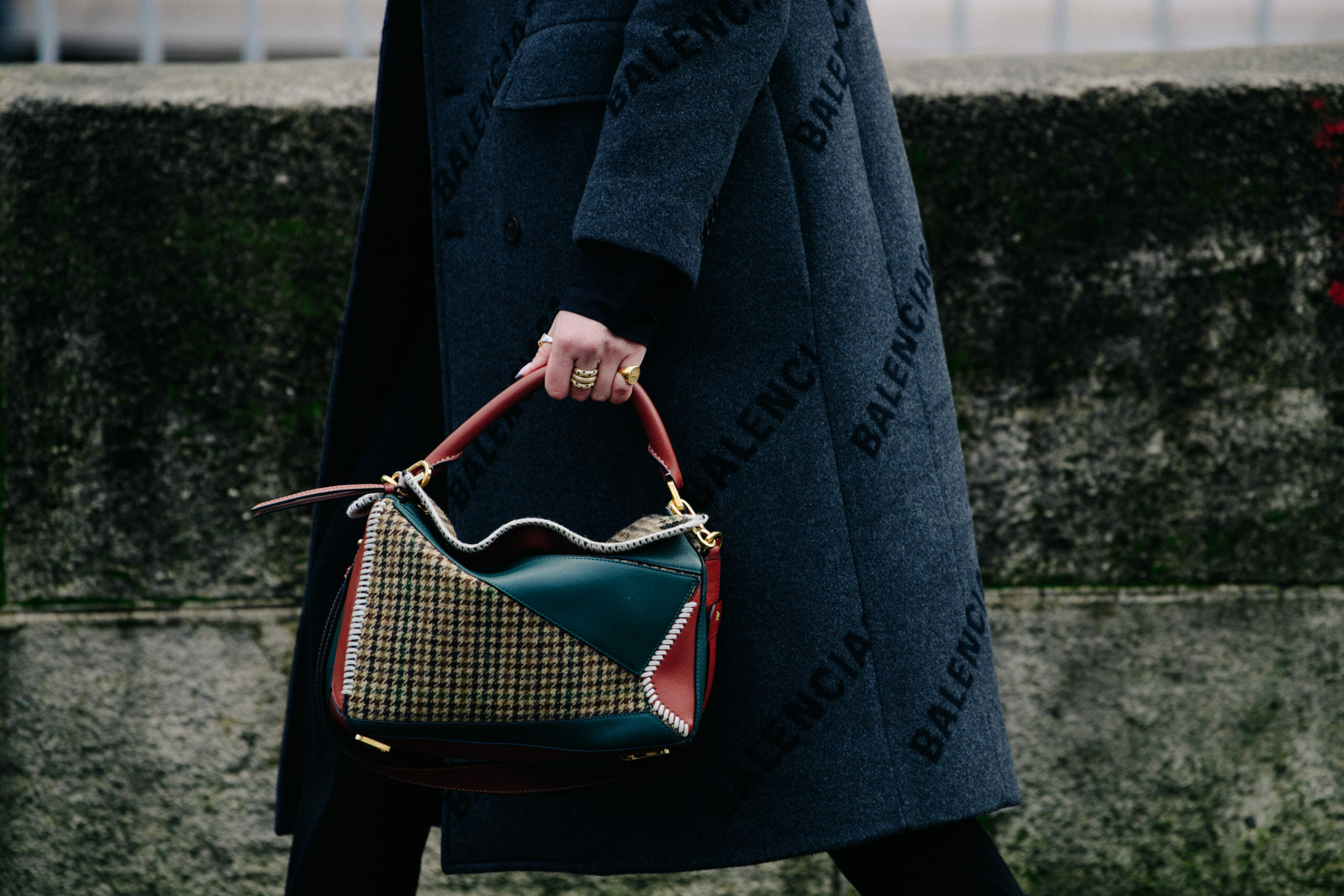 Woman carrying green bag