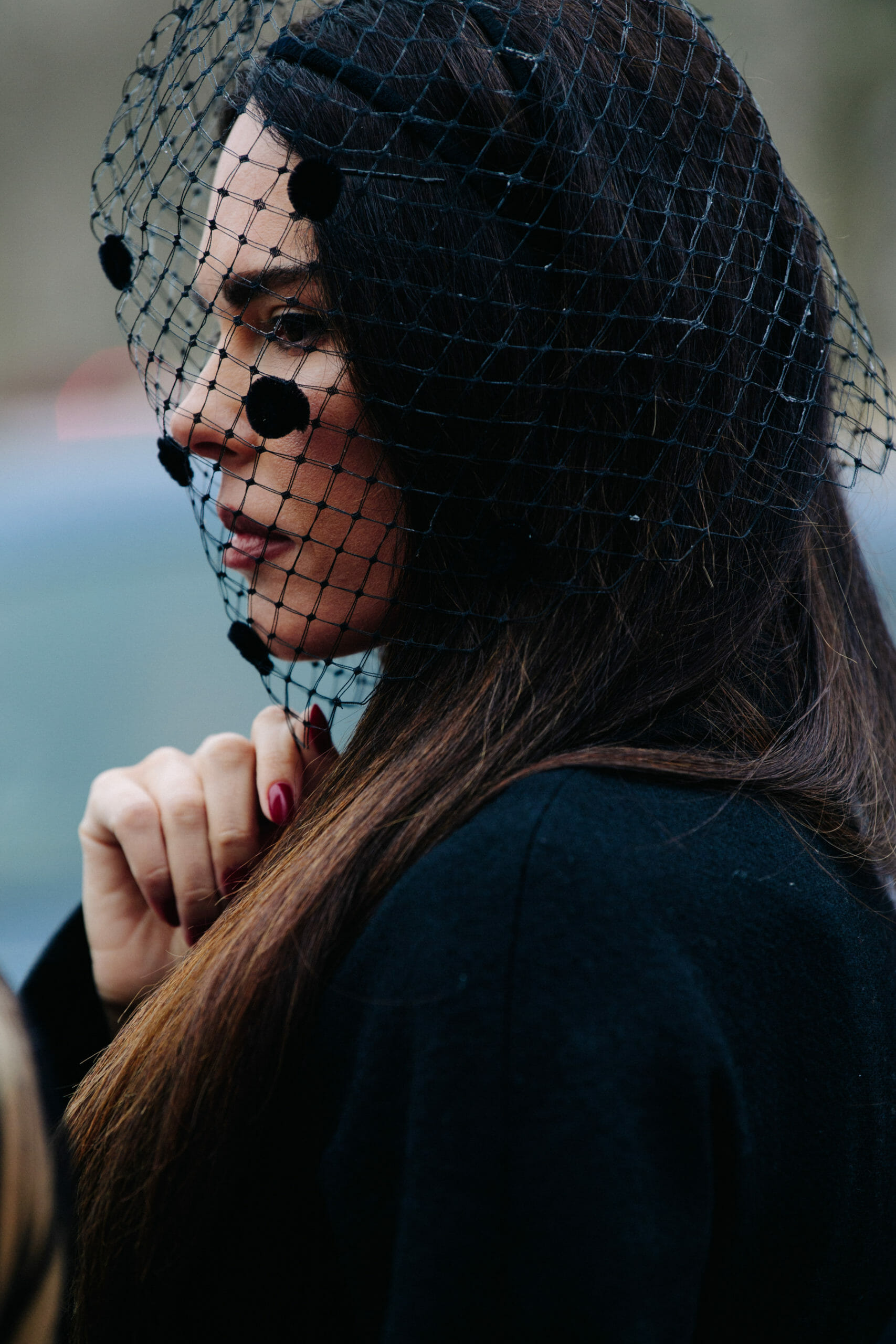 Woman wearing black veil