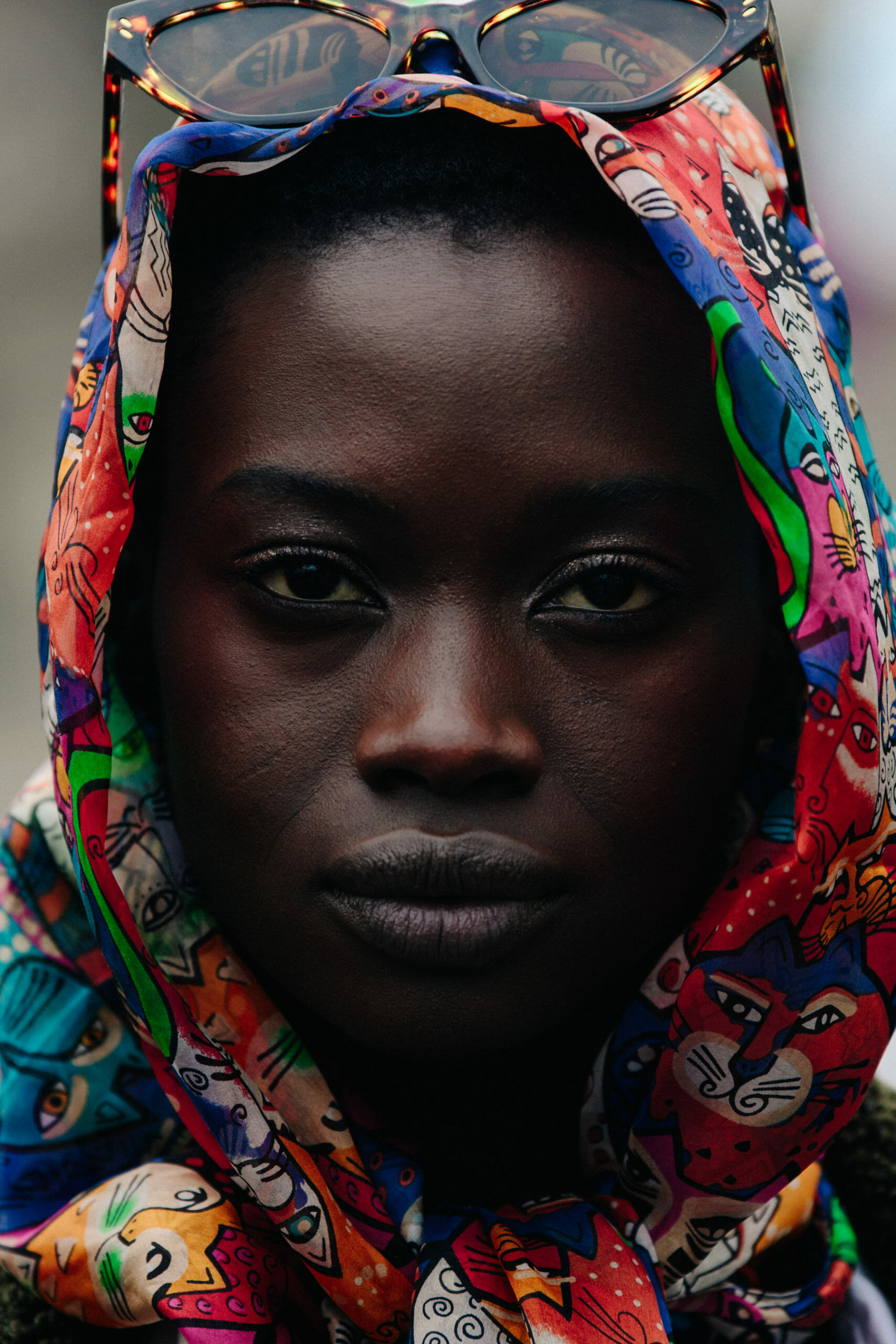 Model wearing colourful headscarf