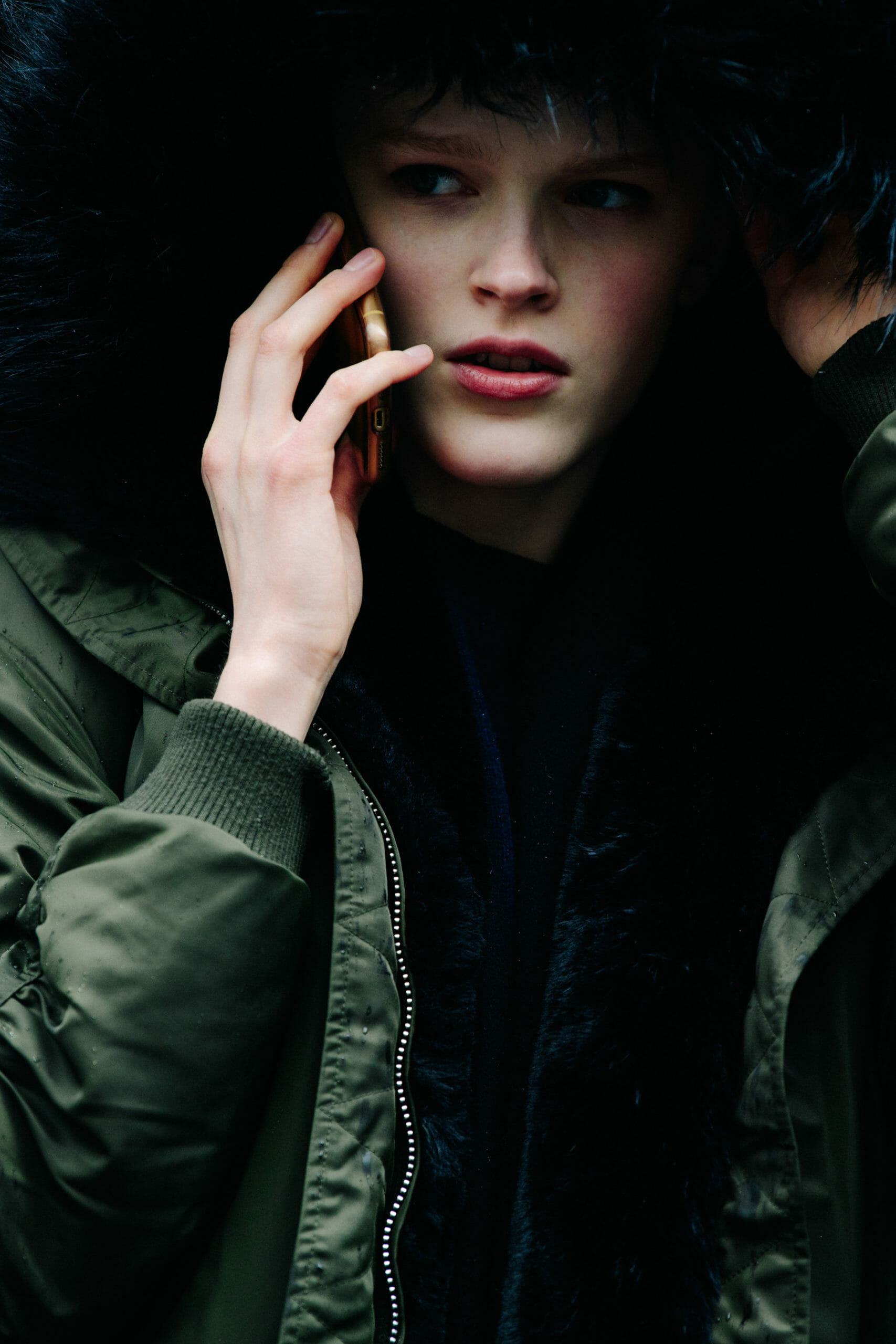 Model wearing hooded coat