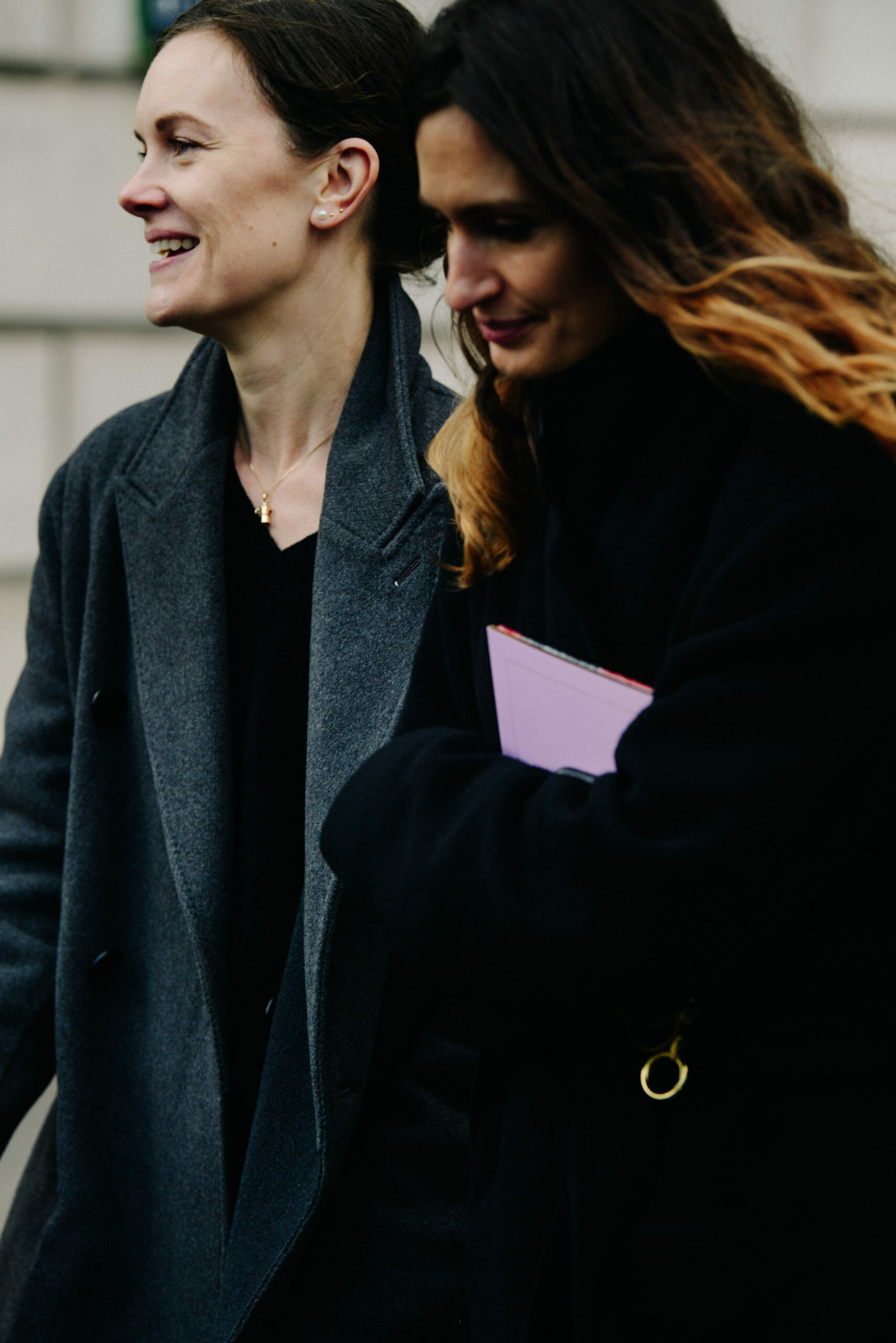 Woman wearing grey coat