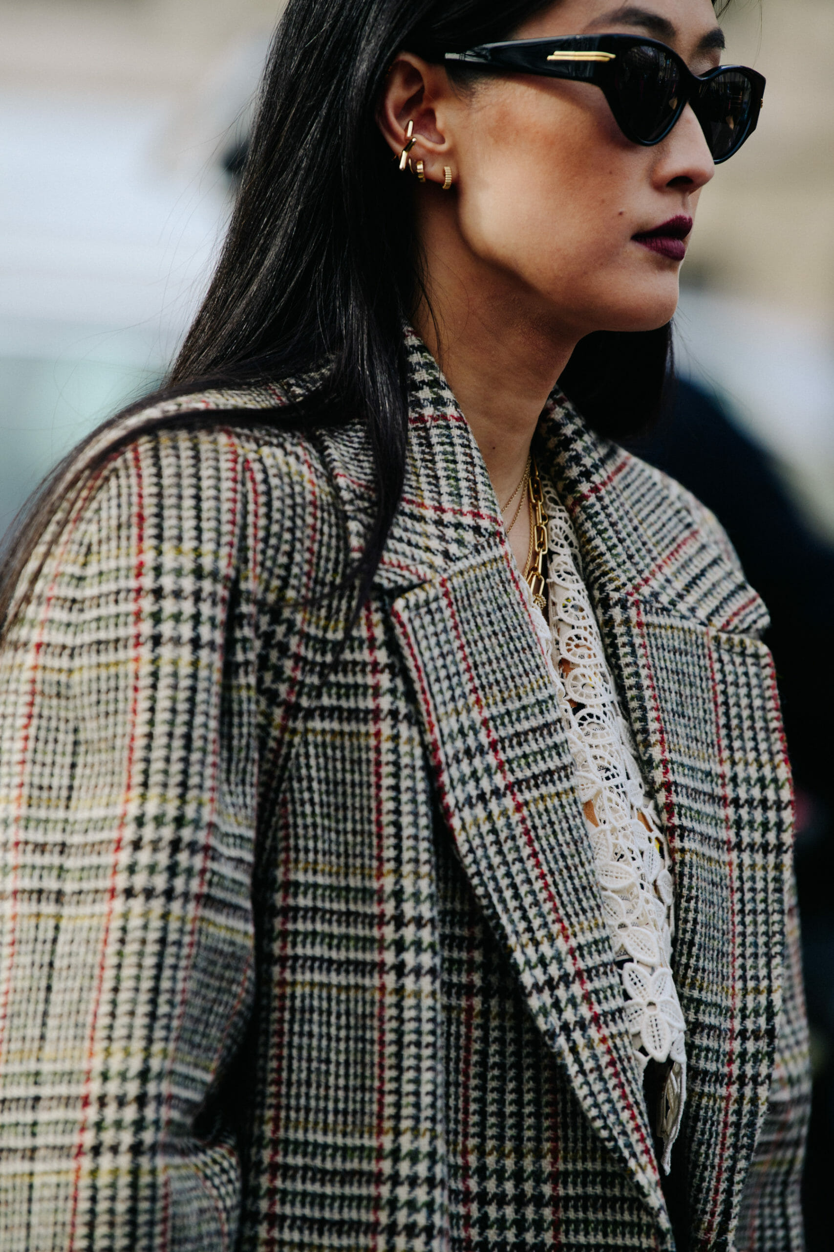 Woman wearing check coat