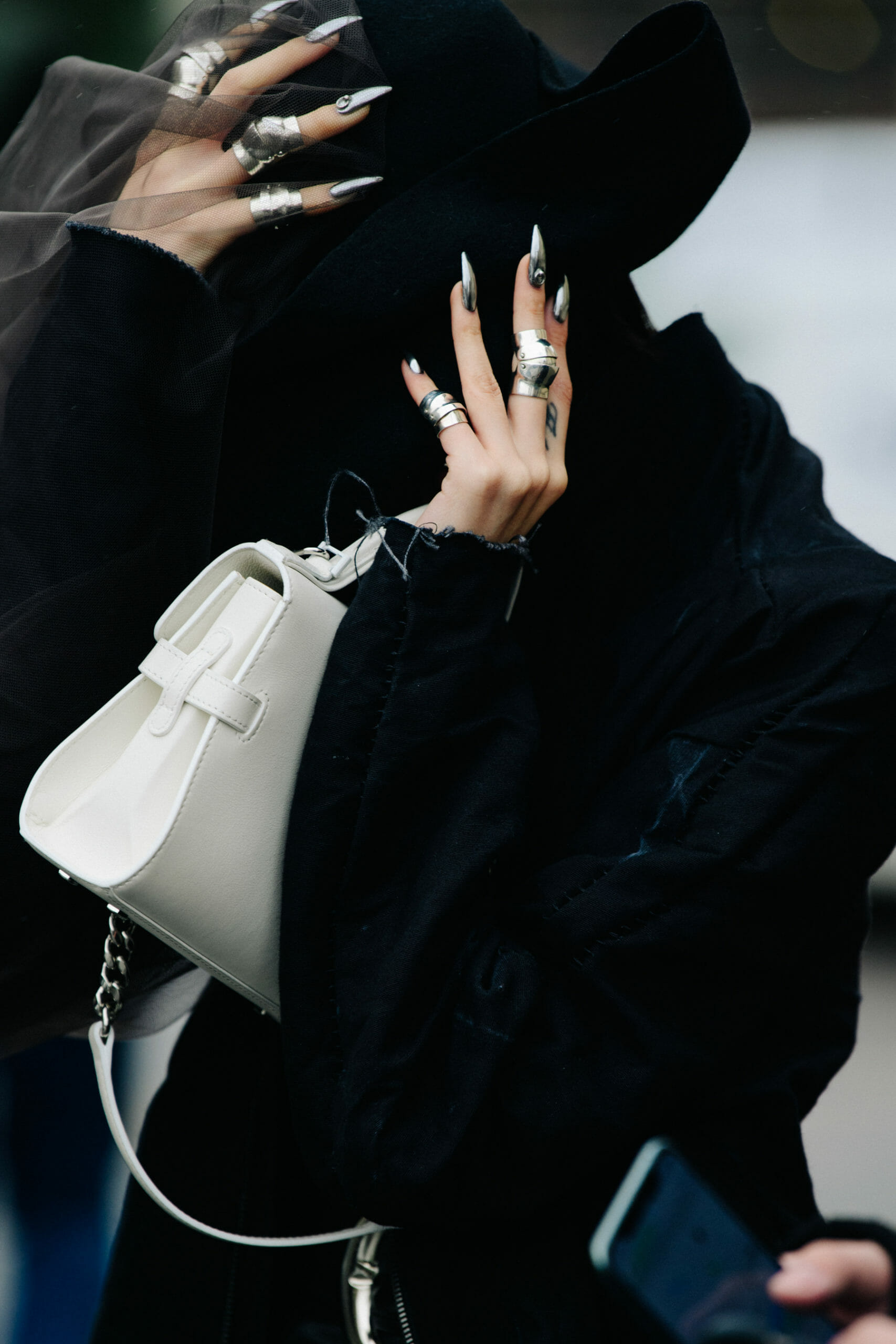 Woman wearing silver nails
