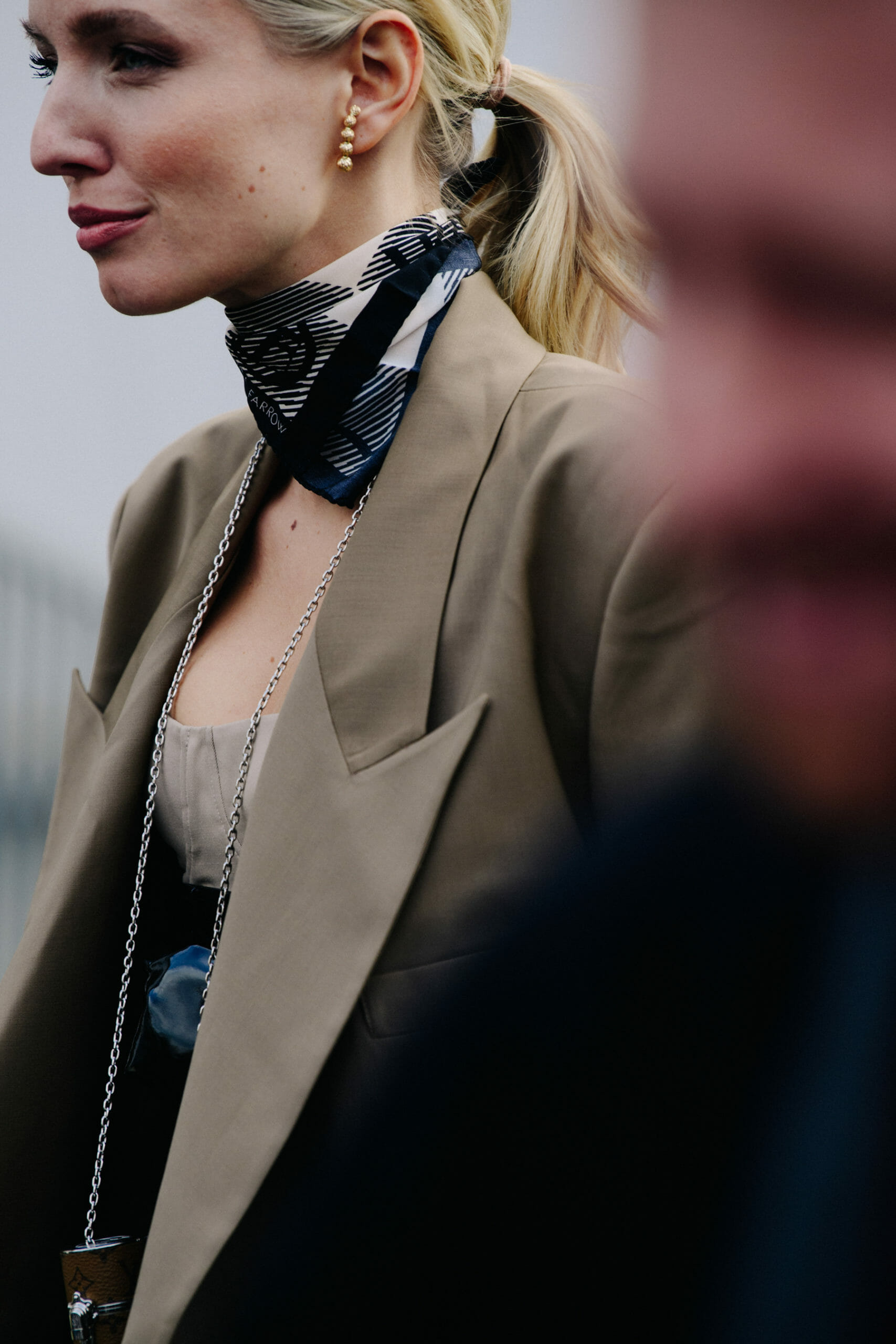 Woman wearing tan blazer